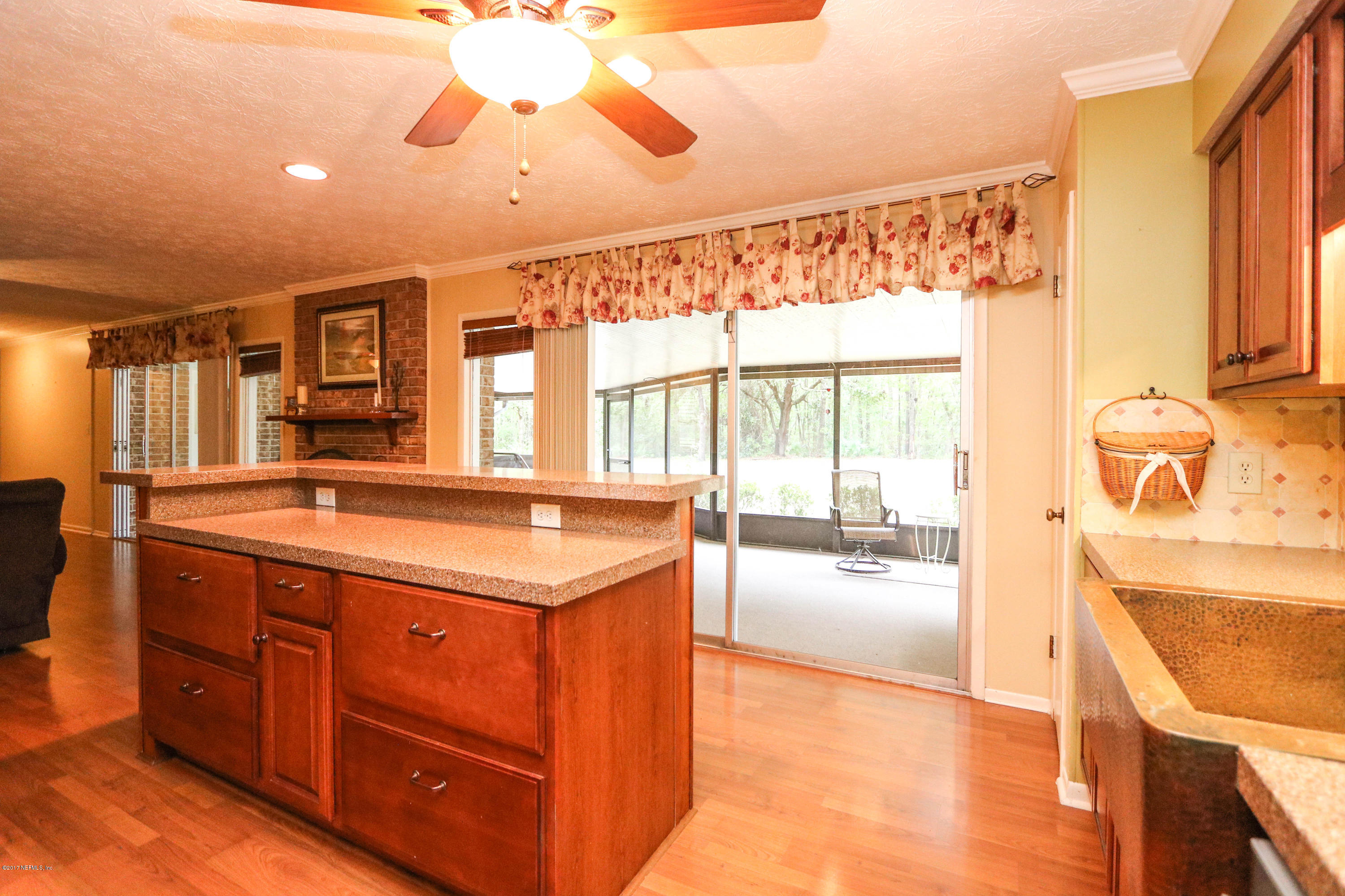 289 Holly Knowe Road Fleming Island, FL 32003 - Photo 24 of 45 Kitchen Breakfast Bar