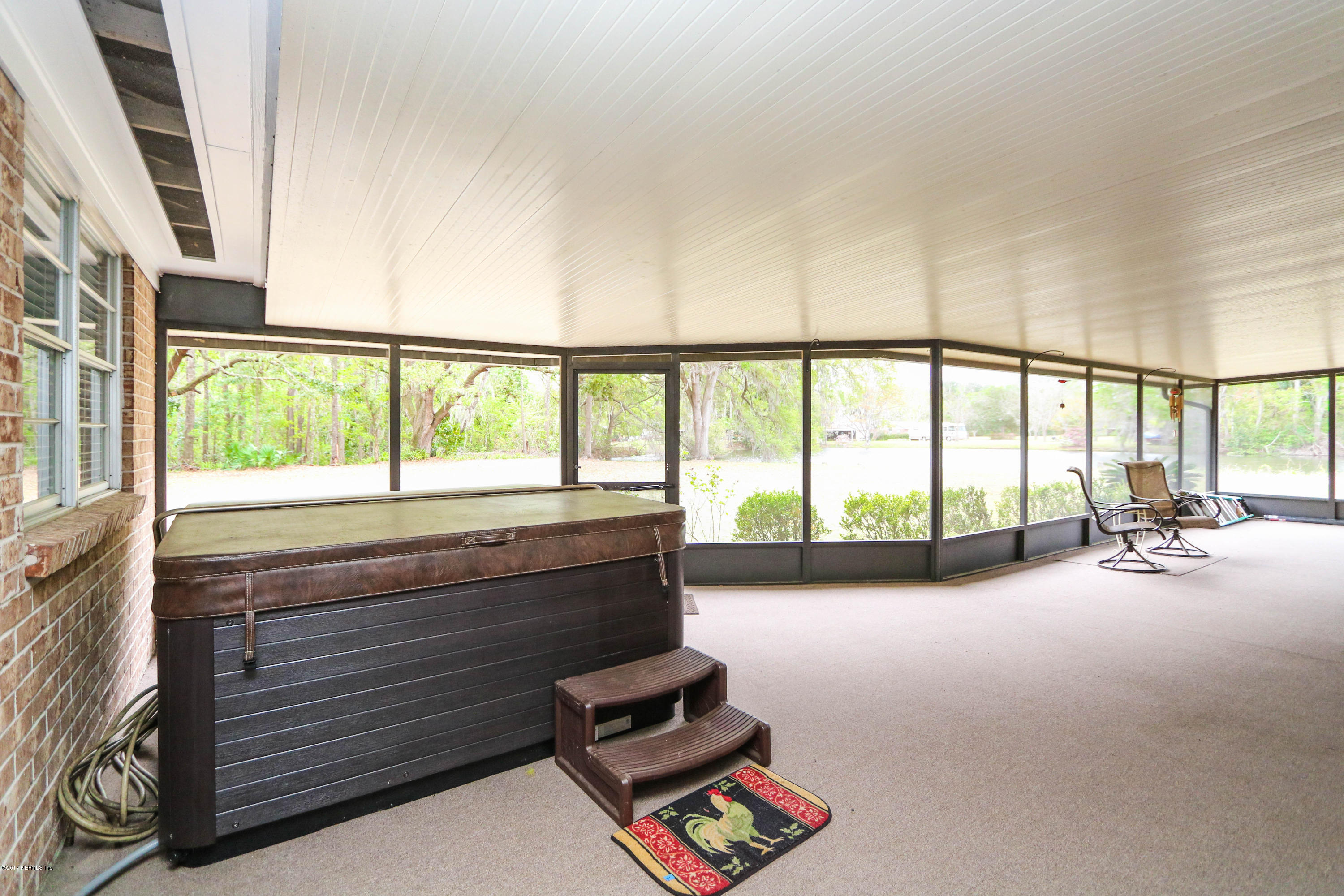 289 Holly Knowe Road Fleming Island, FL 32003 - Photo 38 of 45 Relax on the Screened Patio