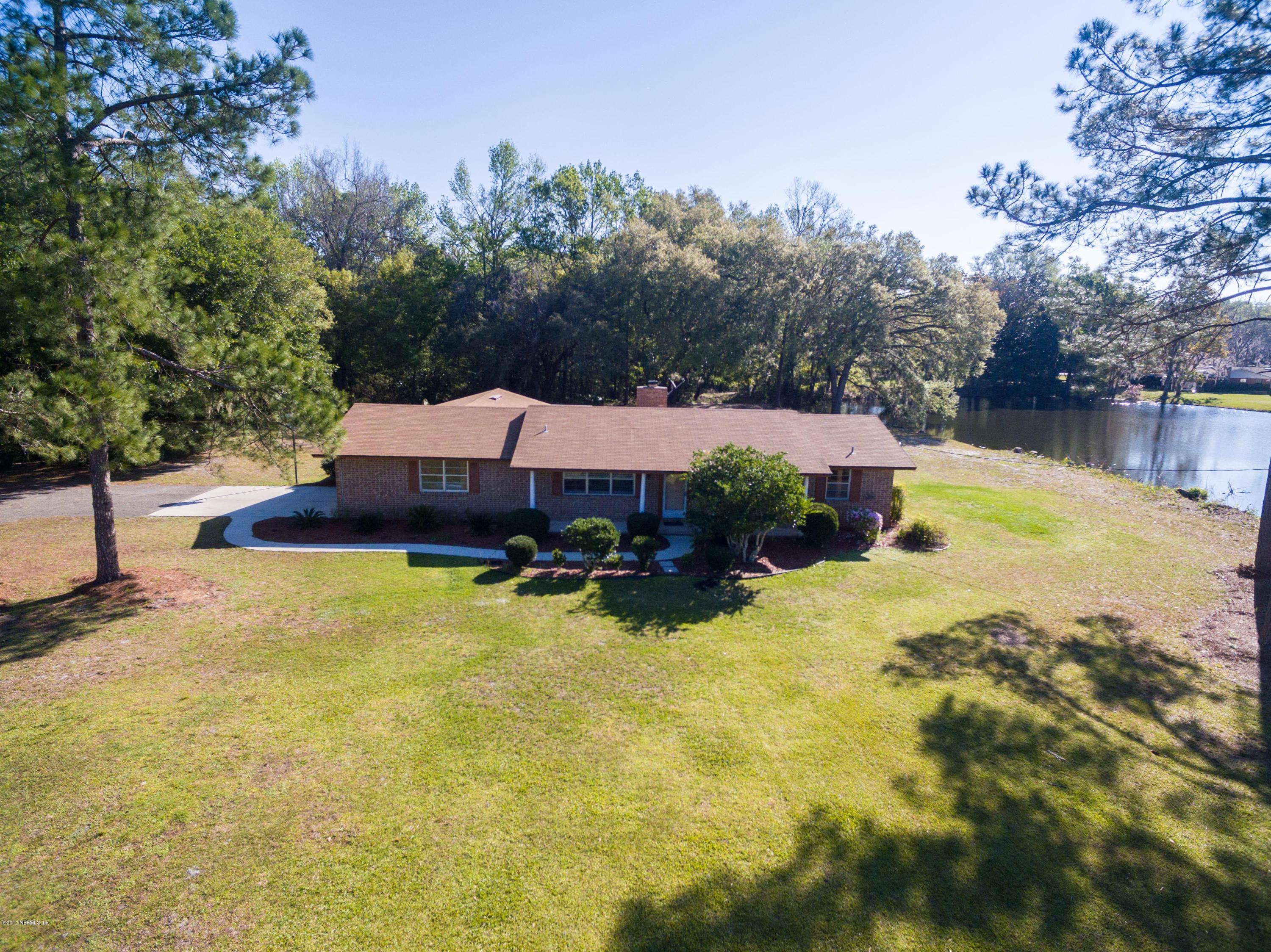 289 Holly Knowe Road Fleming Island, FL 32003 - Photo 44 of 45 Front with Pond