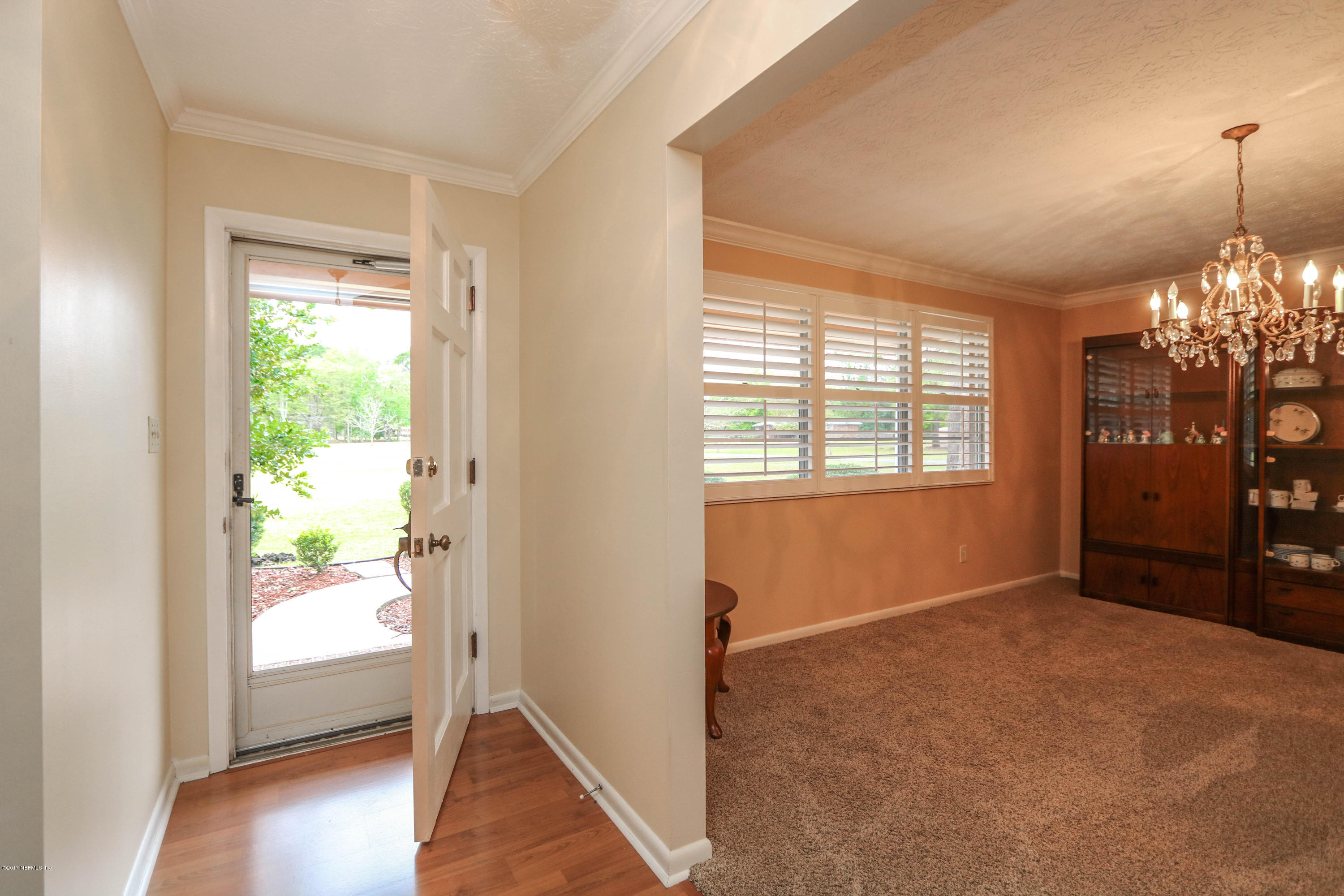 289 Holly Knowe Road Fleming Island, FL 32003 - Photo 5 of 45 Foyer to Dining