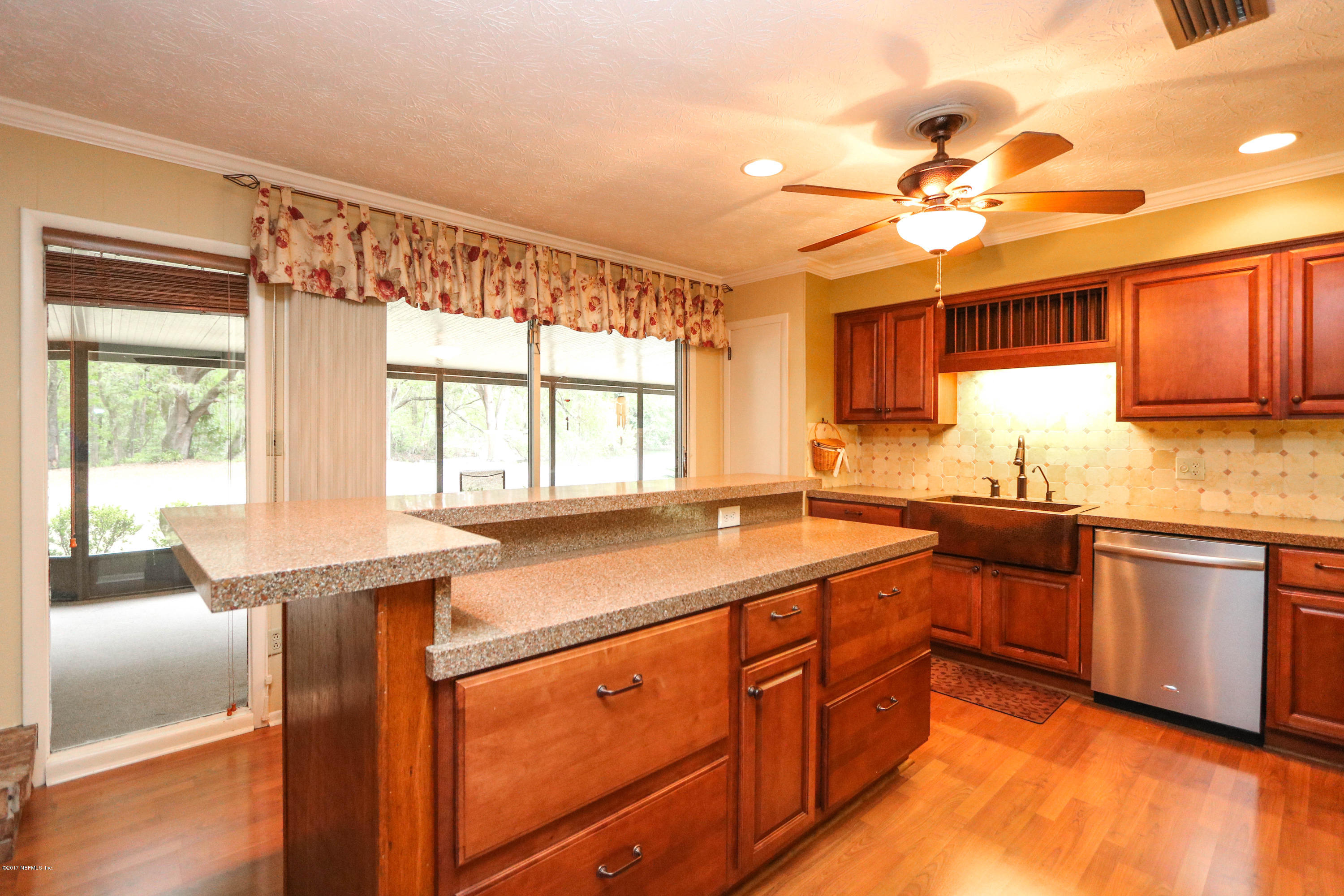 289 Holly Knowe Road Fleming Island, FL 32003 - Photo 8 of 45 Kitchen with Island