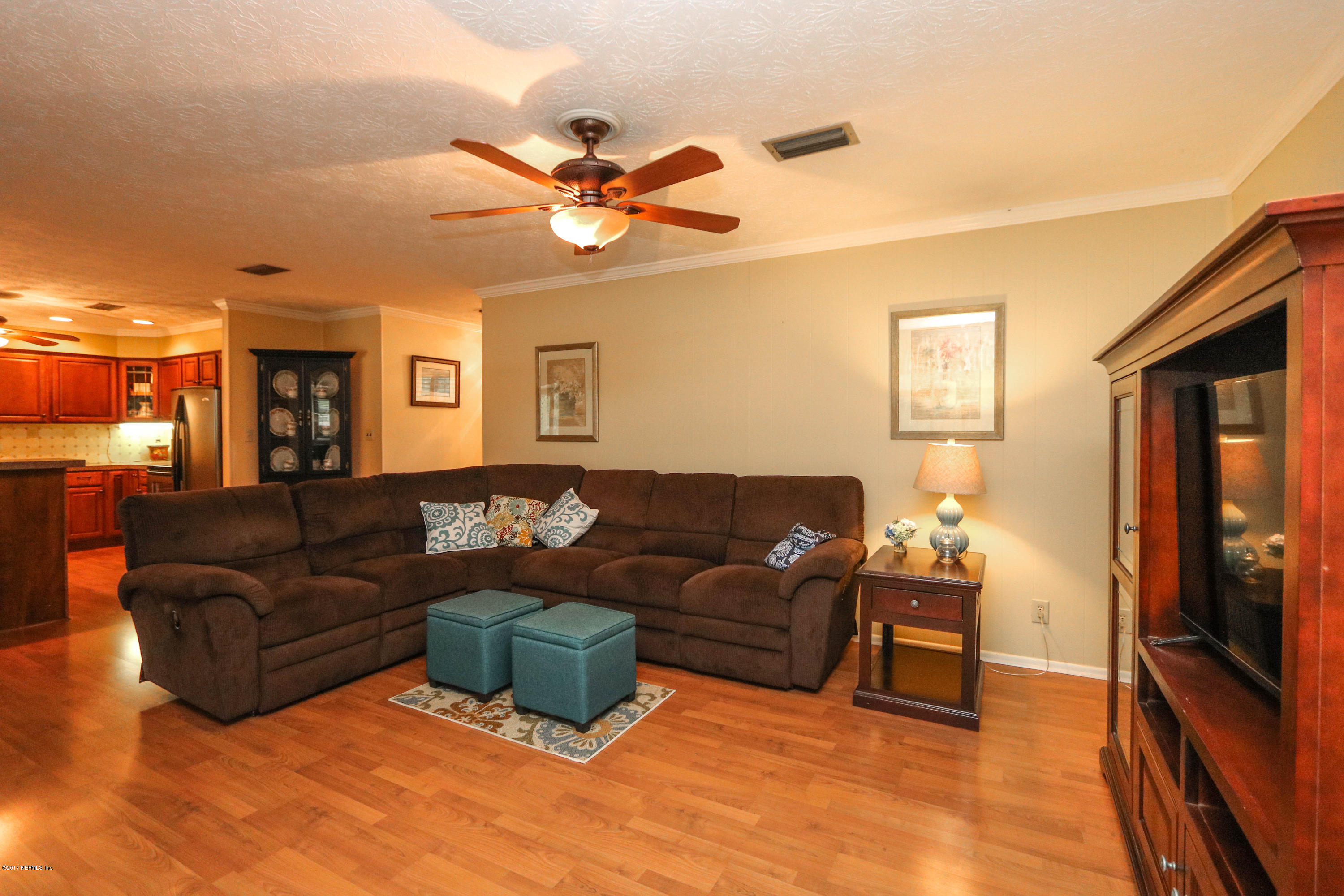 289 Holly Knowe Road Fleming Island, FL 32003 - Photo 9 of 45 Family Room Open to Kitchen