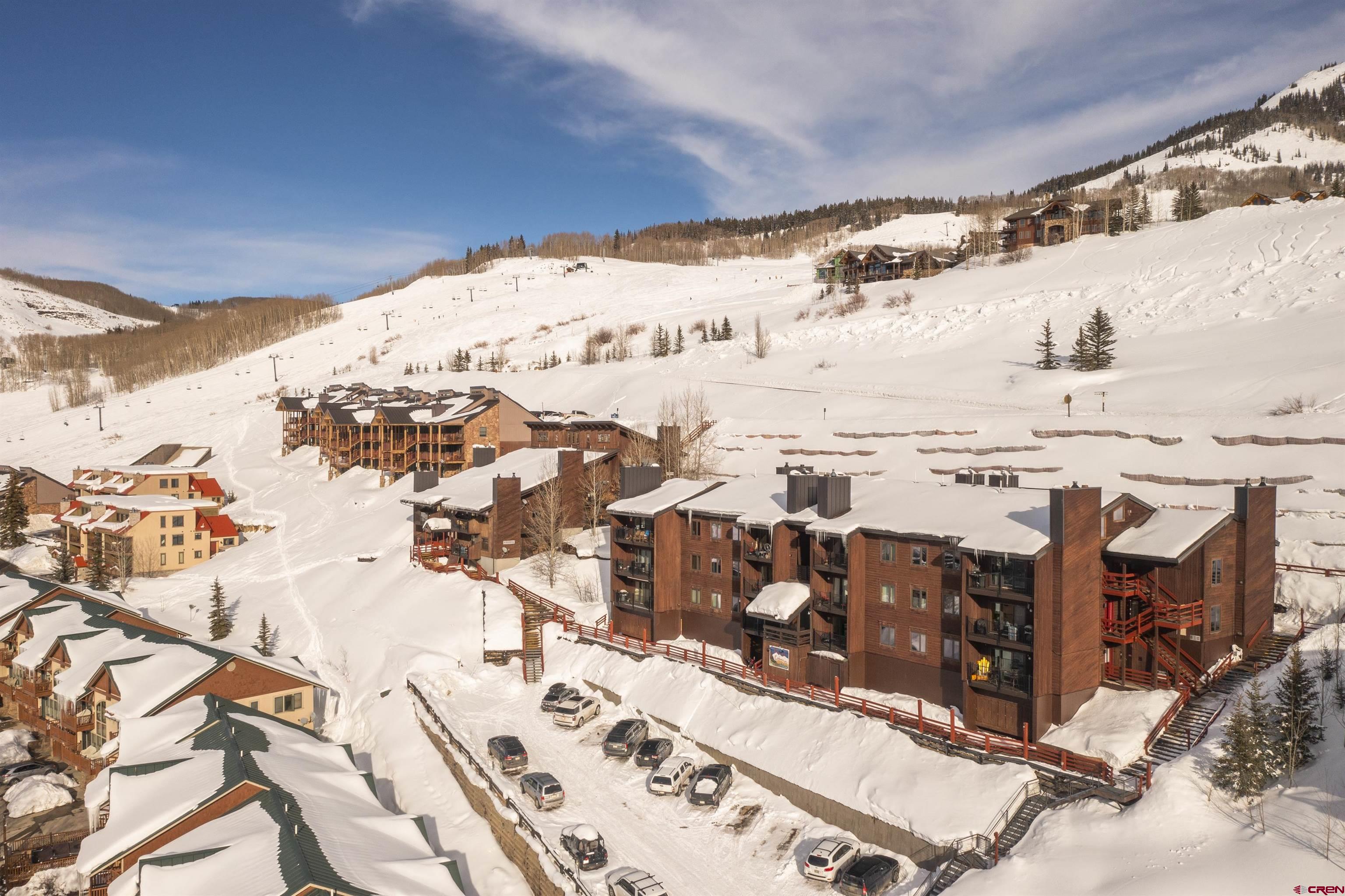 32 Hunter Hill Road, Unit B102 Crested Butte, CO 81225 - Photo 22 of 28 a view of balcony with wooden floor