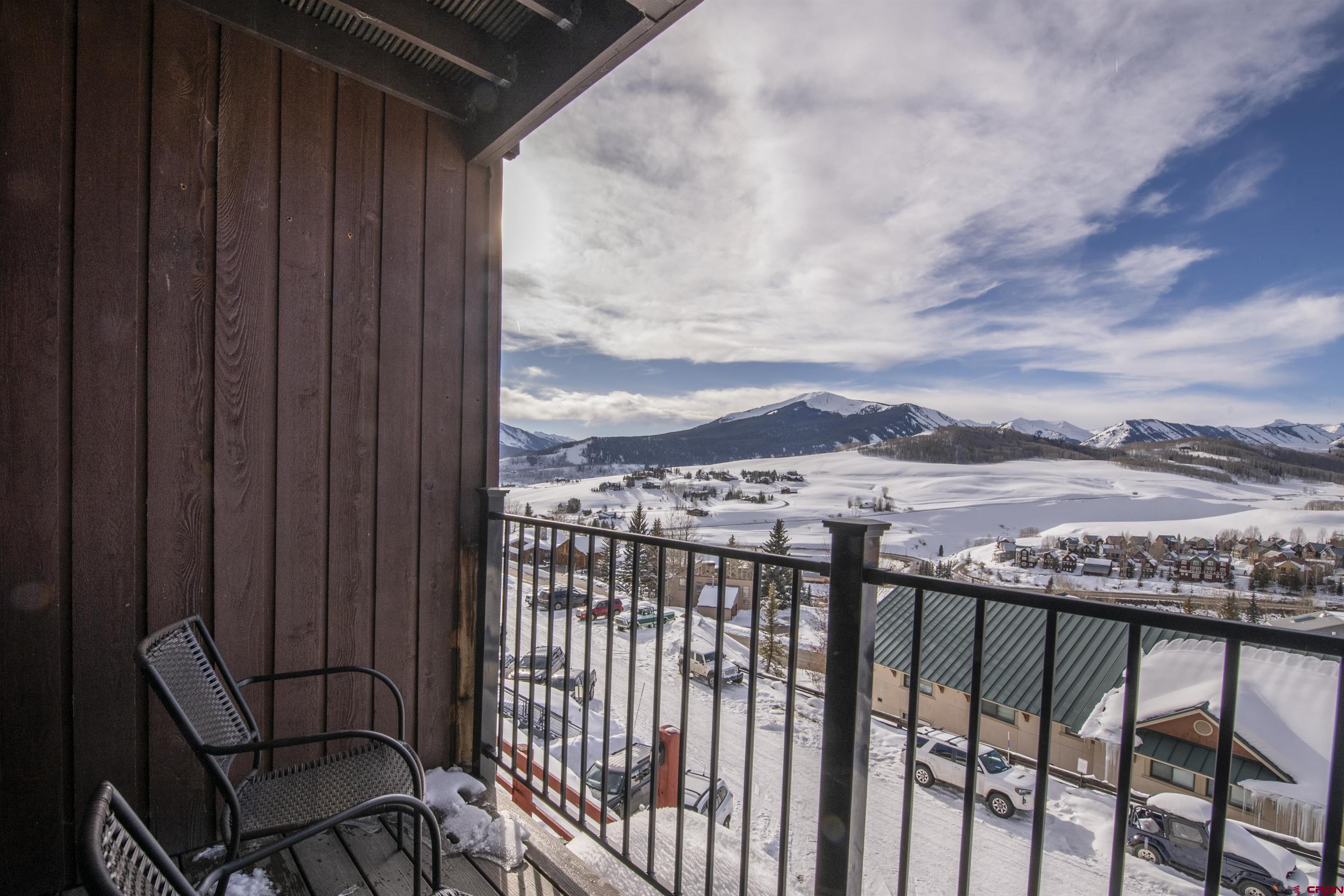 32 Hunter Hill Road, Unit B102 Crested Butte, CO 81225 - Photo 9 of 28 a view of a balcony with an outdoor space