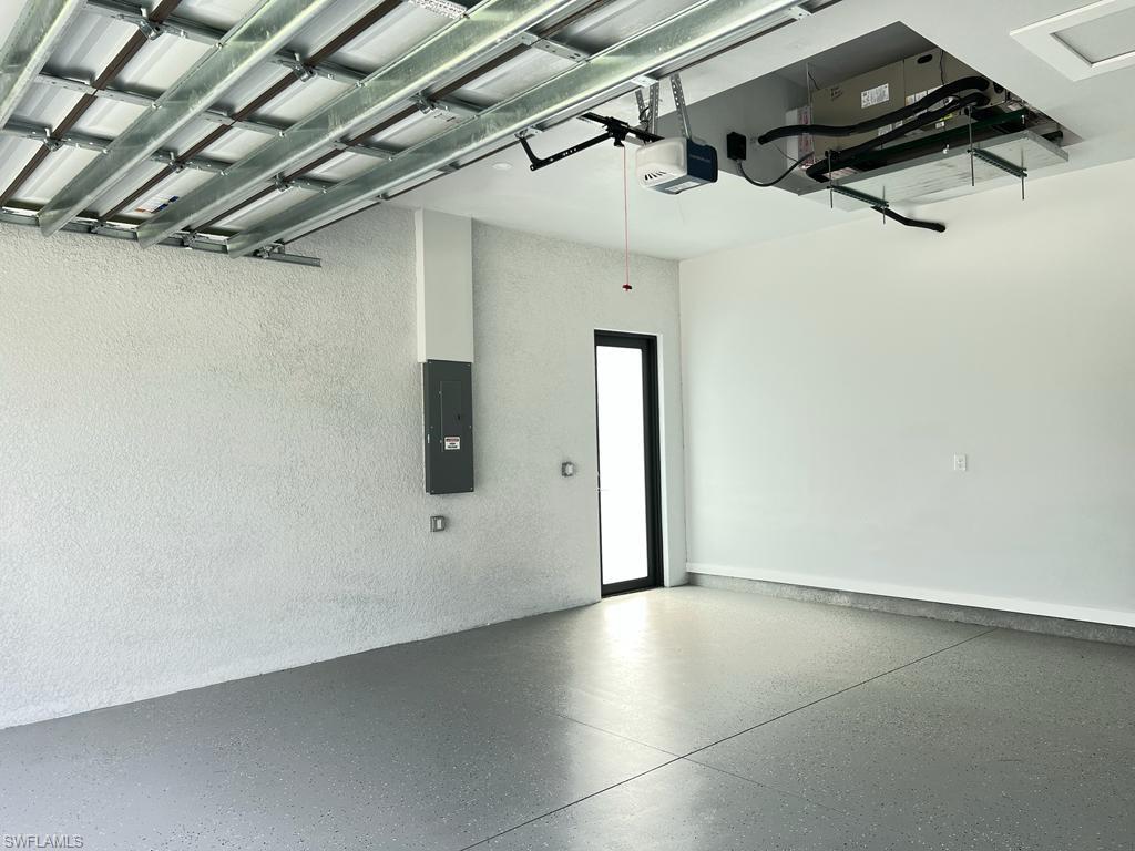 3302 East 3rd Street Lehigh Acres, FL 33936 - Photo 23 of 23 a view of a garage