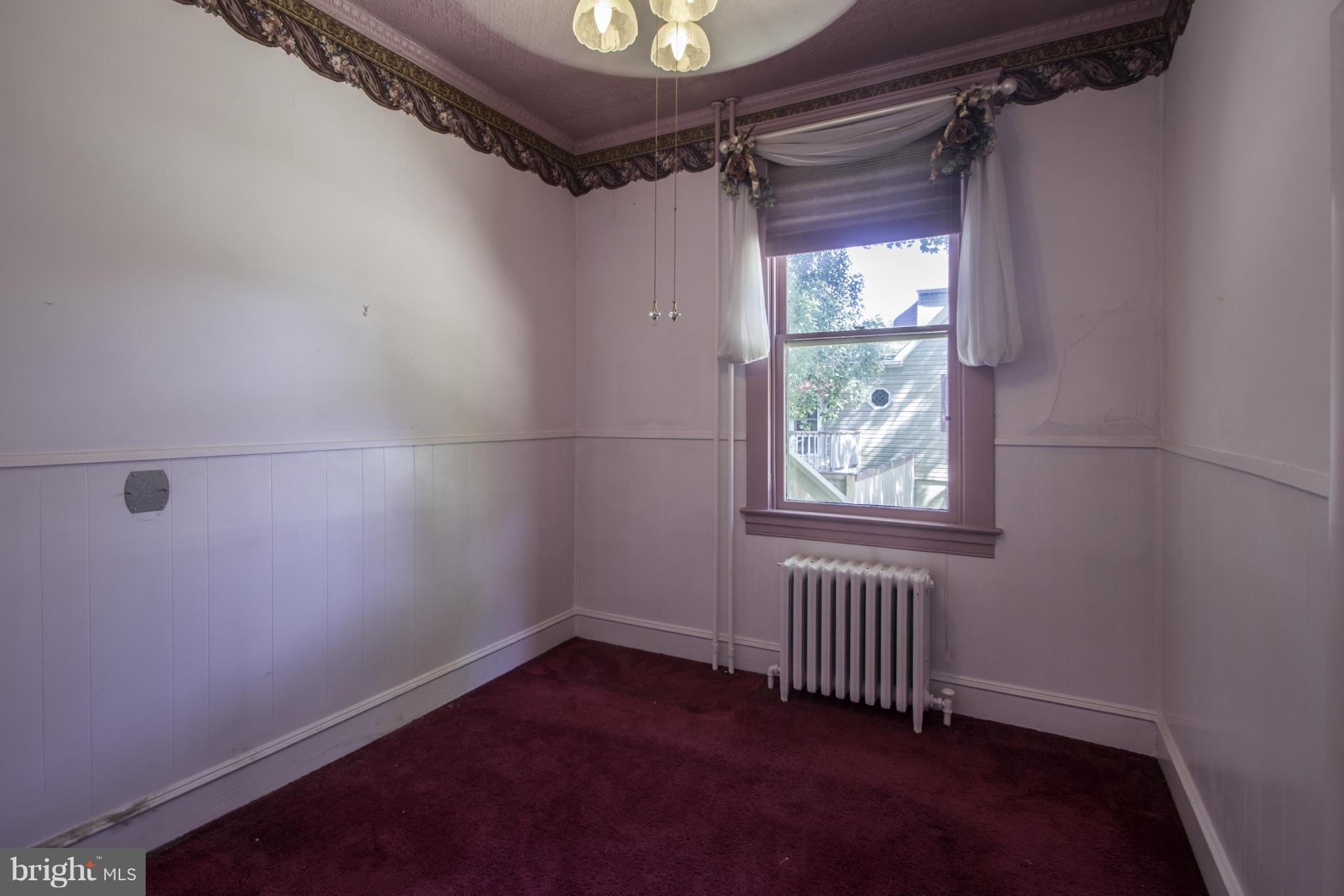112 North Hammonds Ferry Road Linthicum Heights, MD 21090 - Photo 19 of 30 a view of an empty room with a window