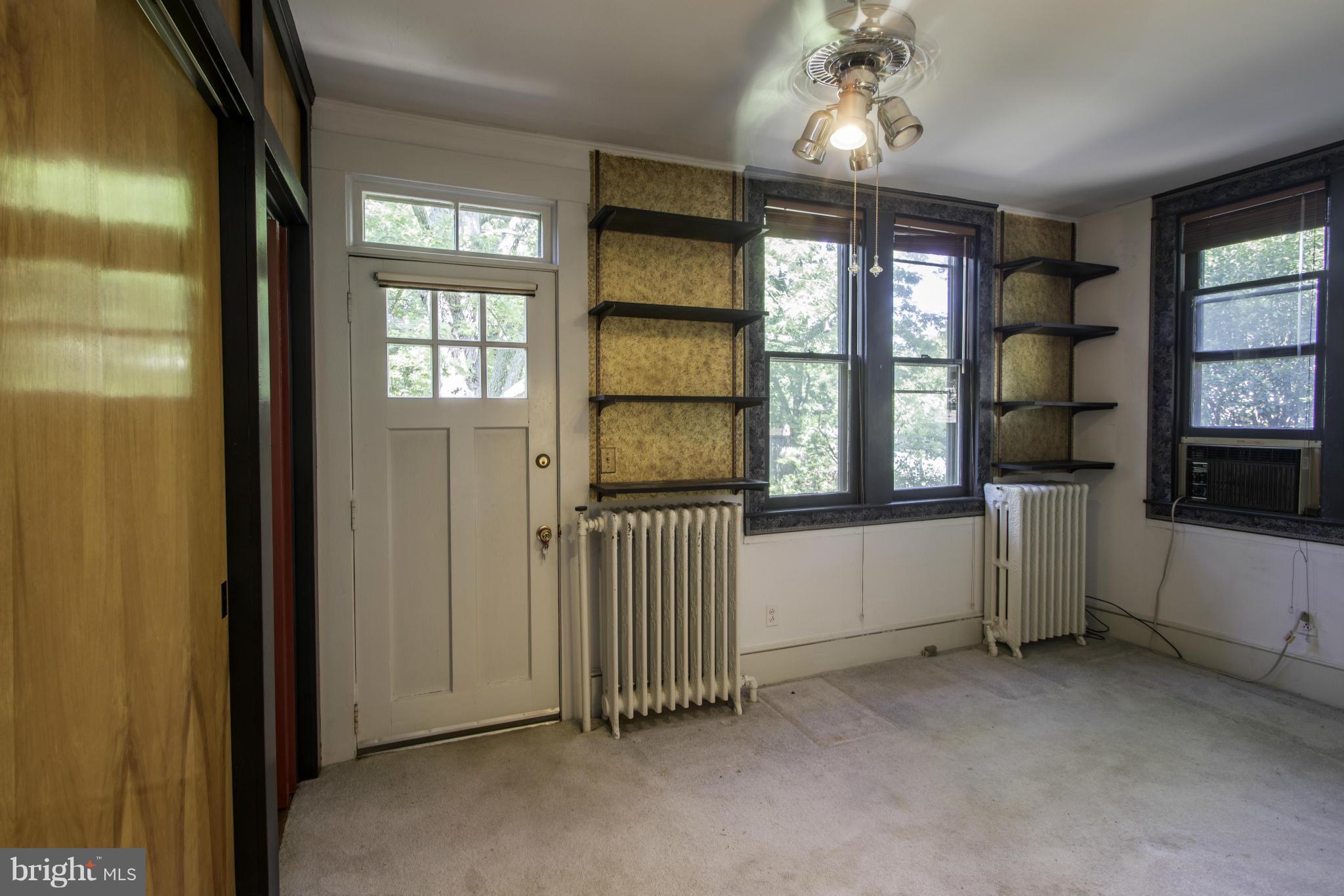 112 North Hammonds Ferry Road Linthicum Heights, MD 21090 - Photo 21 of 30 a view of an empty room with a window