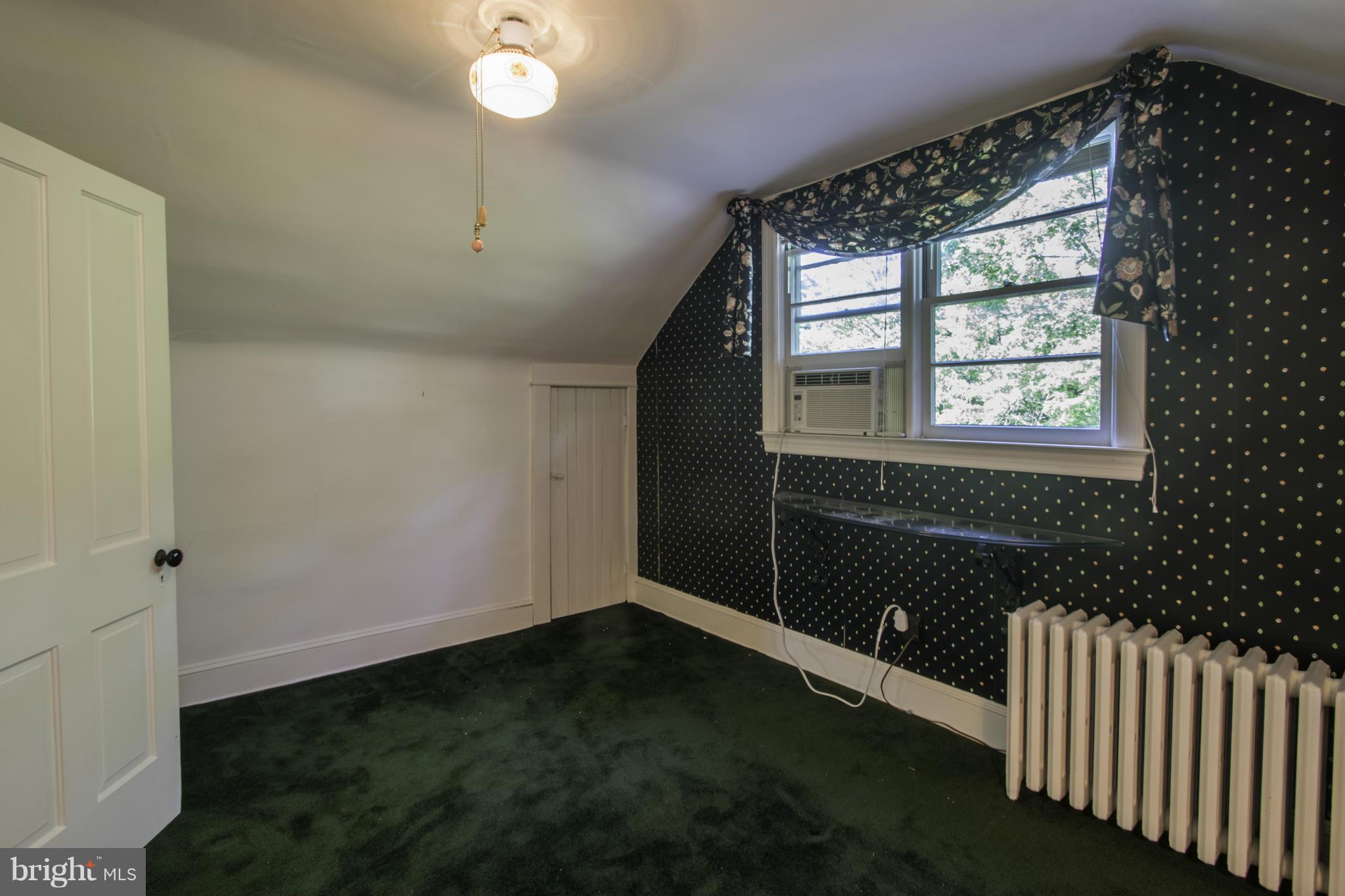 112 North Hammonds Ferry Road Linthicum Heights, MD 21090 - Photo 24 of 30 wooden floor in an empty room with a window