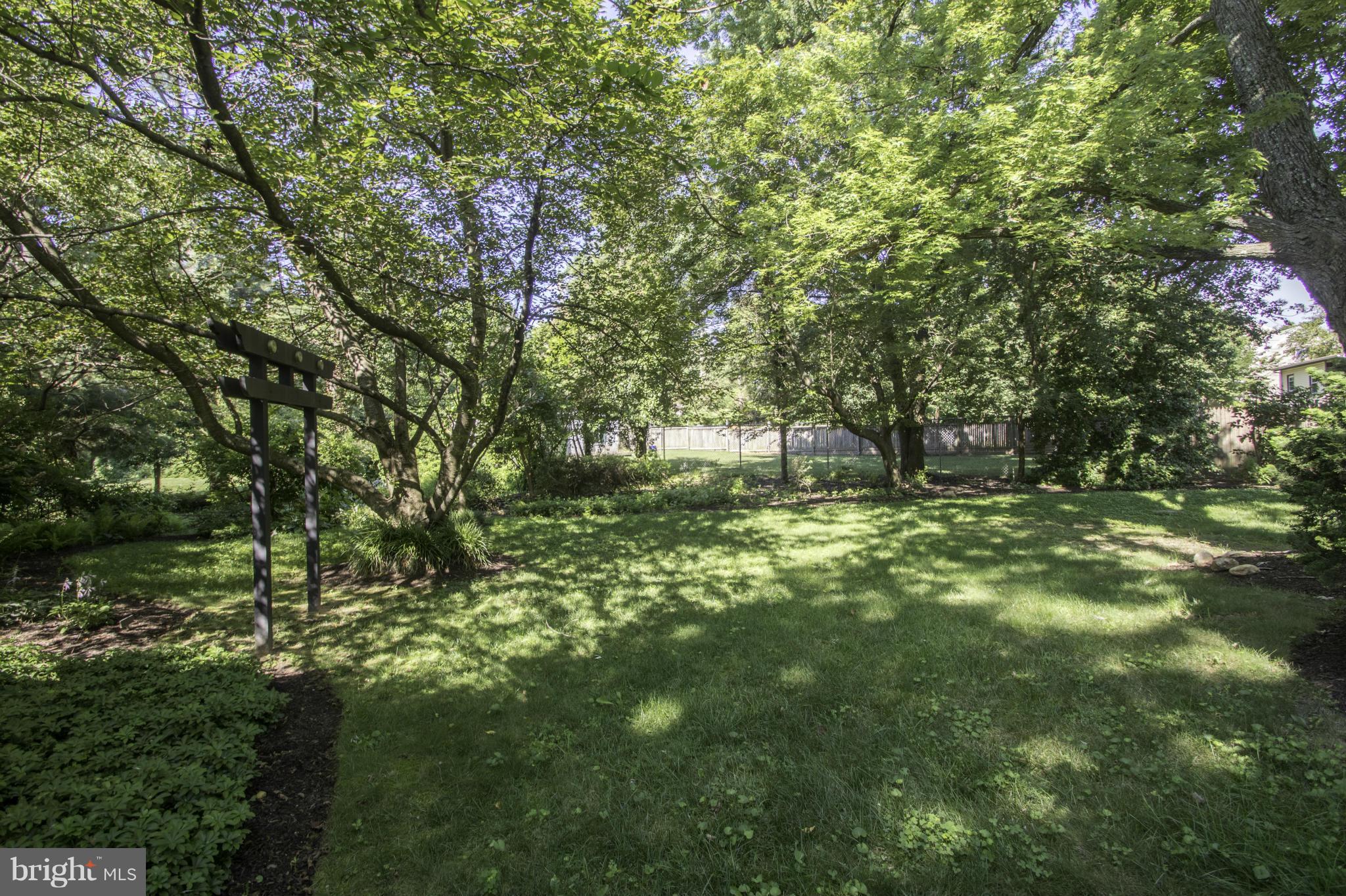 112 North Hammonds Ferry Road Linthicum Heights, MD 21090 - Photo 28 of 30 a big yard with lots of green space and trees all around