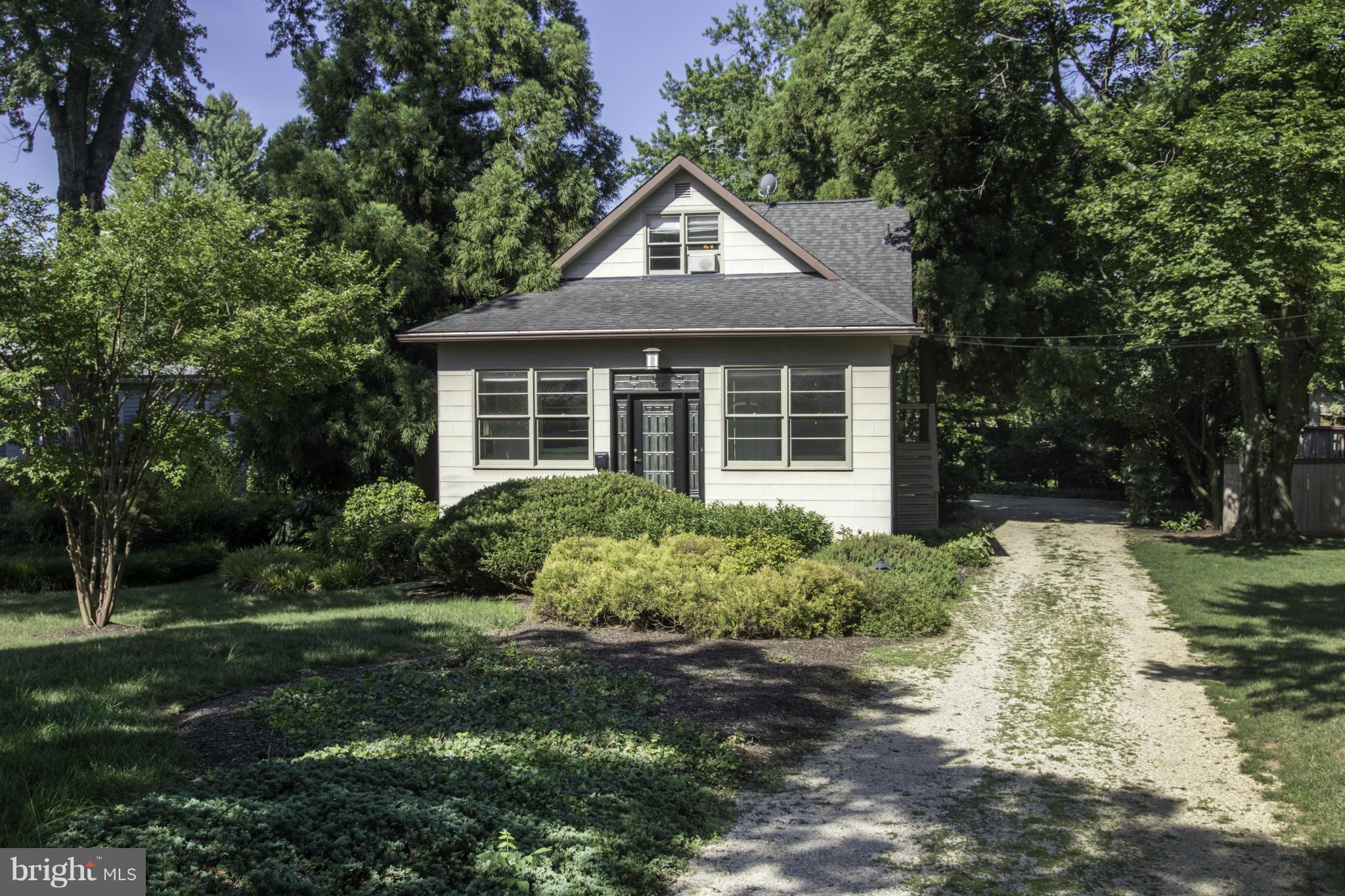 112 North Hammonds Ferry Road Linthicum Heights, MD 21090 - Photo 4 of 30 a front view of a house with garden