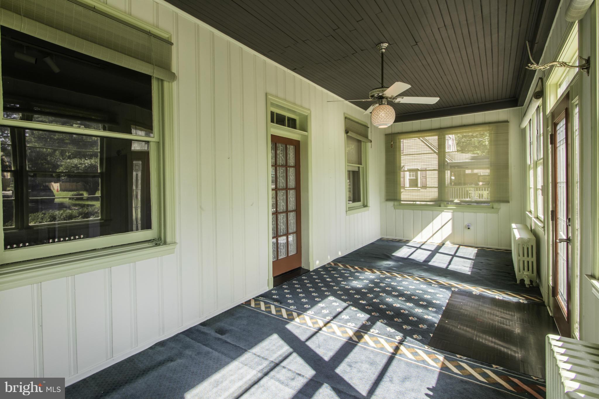 112 North Hammonds Ferry Road Linthicum Heights, MD 21090 - Photo 6 of 30 a bedroom with a bed wooden floor and a window