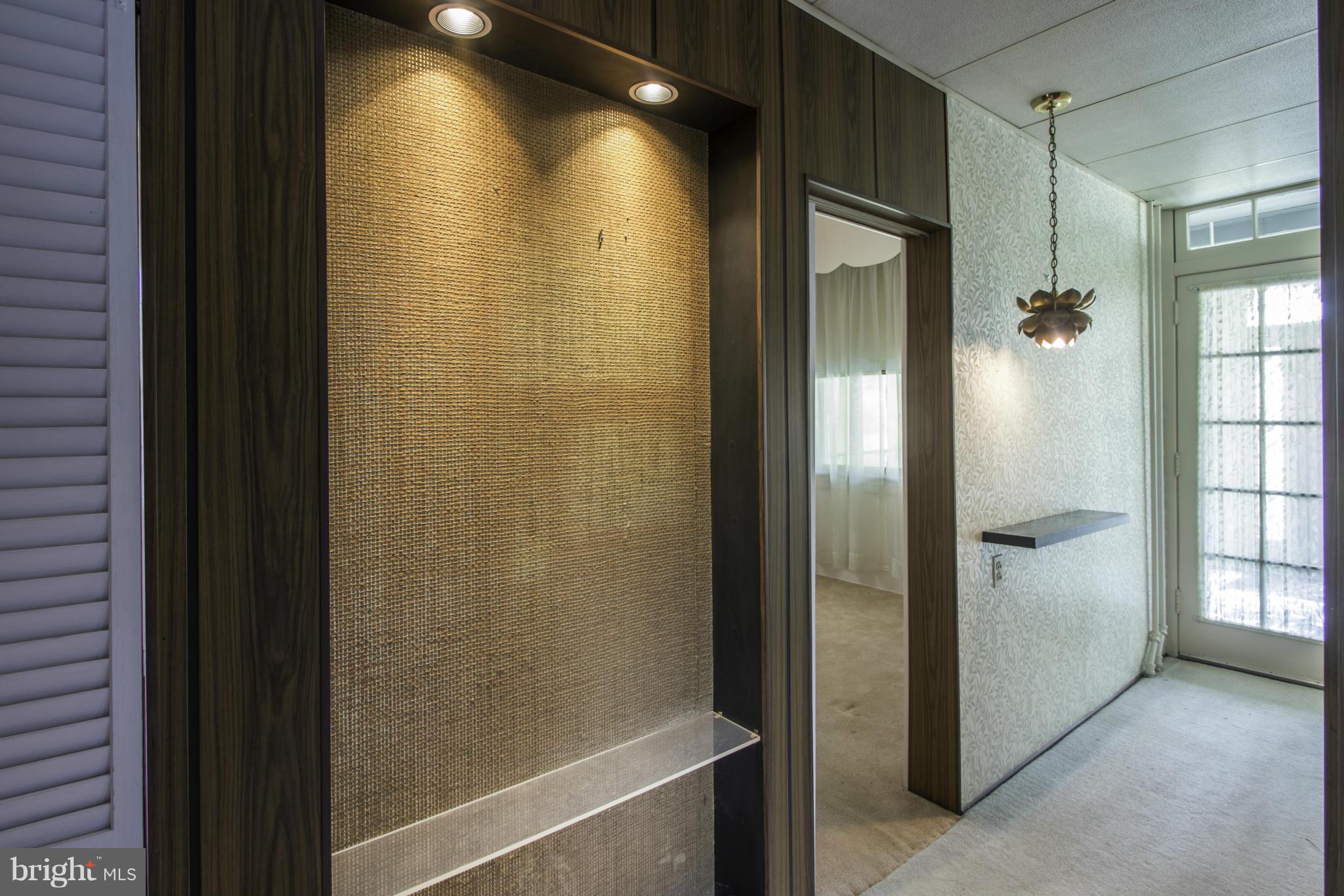 112 North Hammonds Ferry Road Linthicum Heights, MD 21090 - Photo 9 of 30 a bathroom with a shower and a glass door