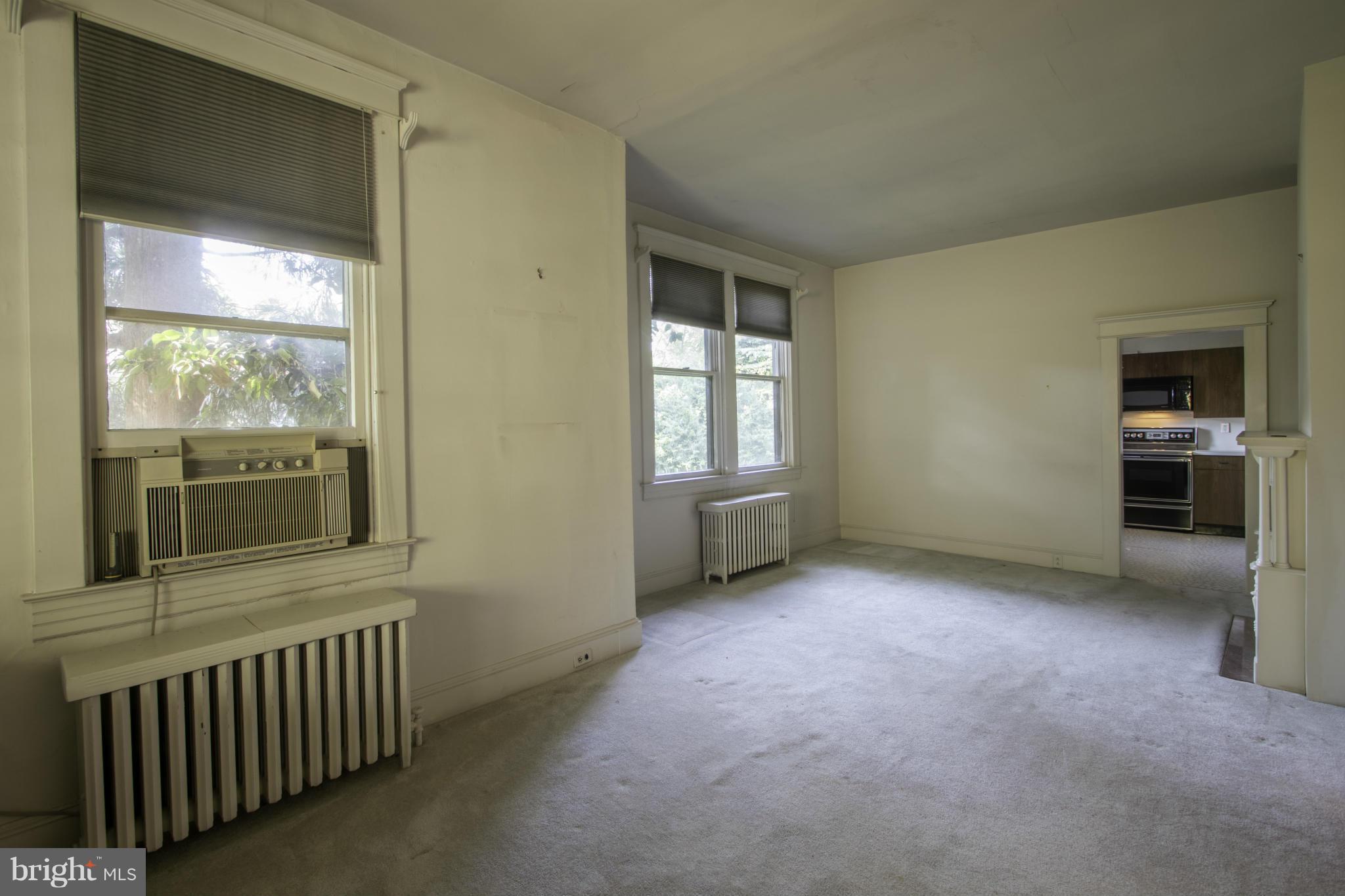112 North Hammonds Ferry Road Linthicum Heights, MD 21090 - Photo 10 of 30 an empty room with windows