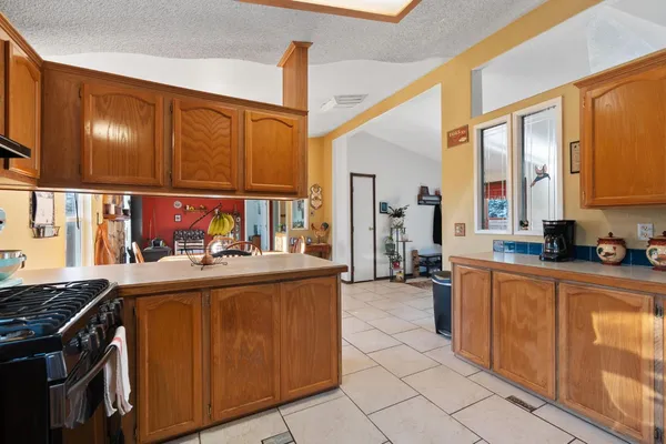 a view of a livingroom with furniture and windows
