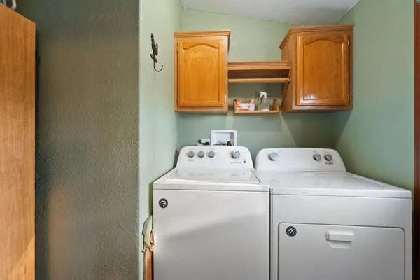 a backyard of a house with lots of green space