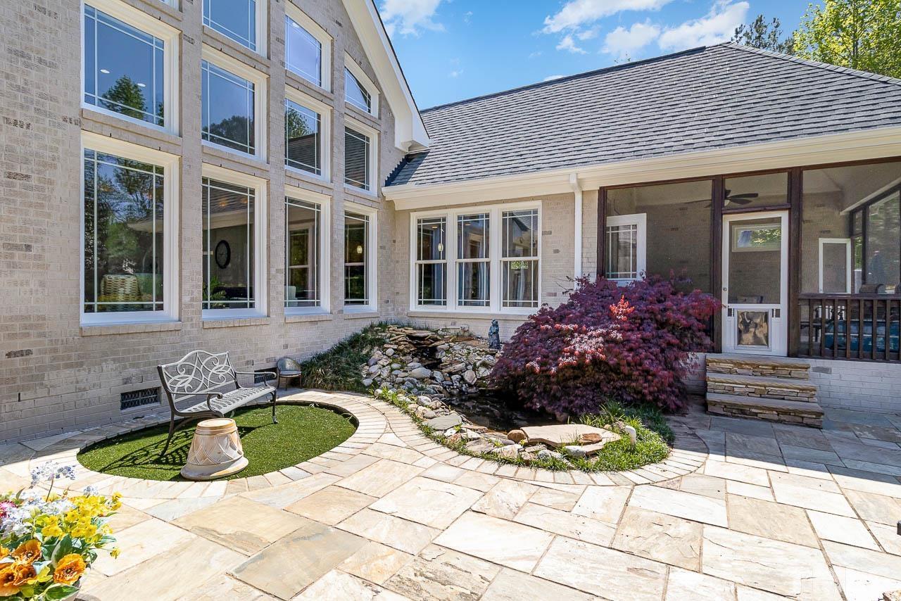 412 Deep Woods Trail Wake Forest, NC 27587 - Photo 19 of 35 a view of a house with yard and sitting area