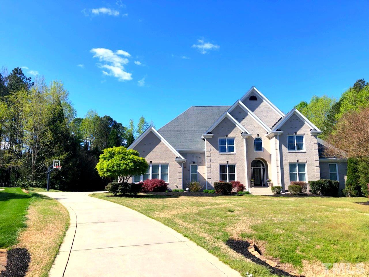 412 Deep Woods Trail Wake Forest, NC 27587 - Photo 2 of 35 a front view of a house with a yard outdoor seating and entertaining space