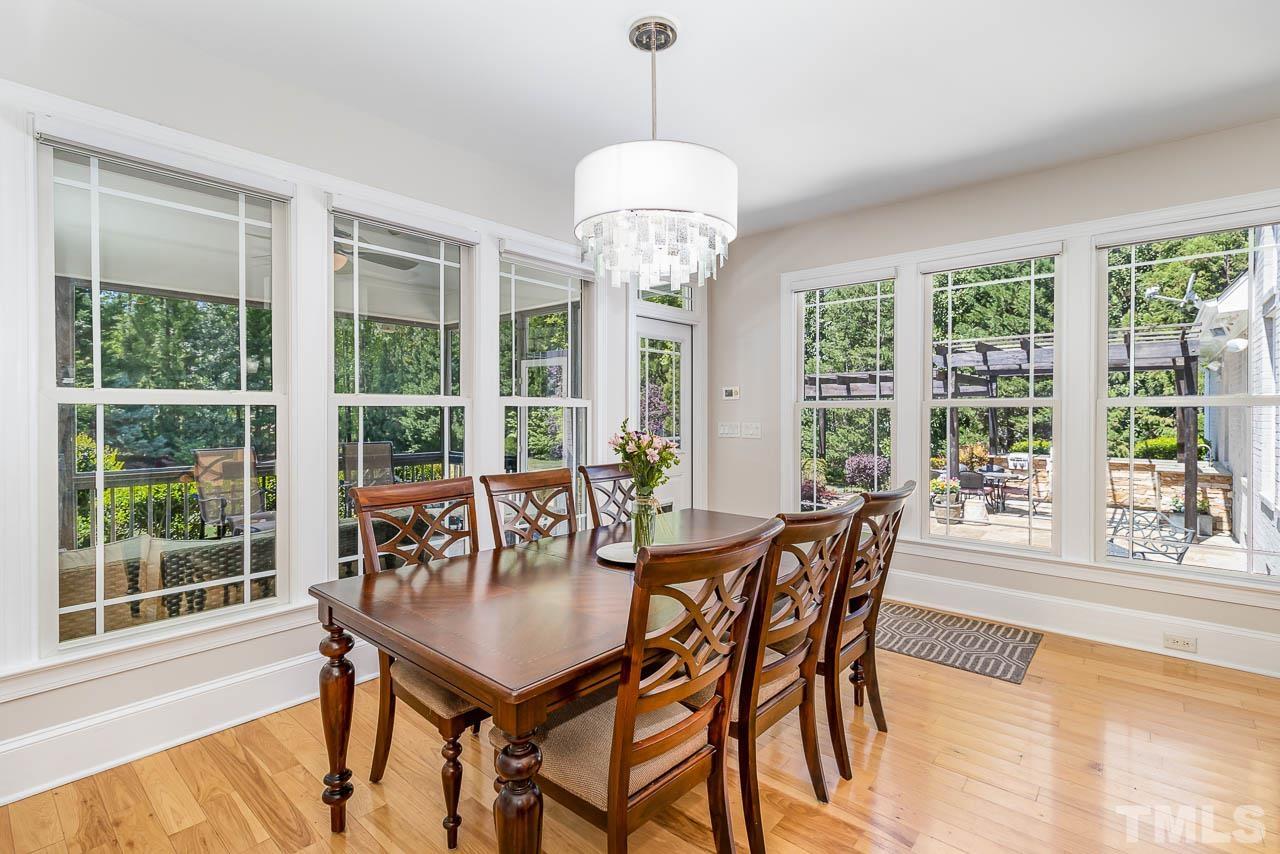 412 Deep Woods Trail Wake Forest, NC 27587 - Photo 31 of 35 a view of a dining room with furniture window and outside view