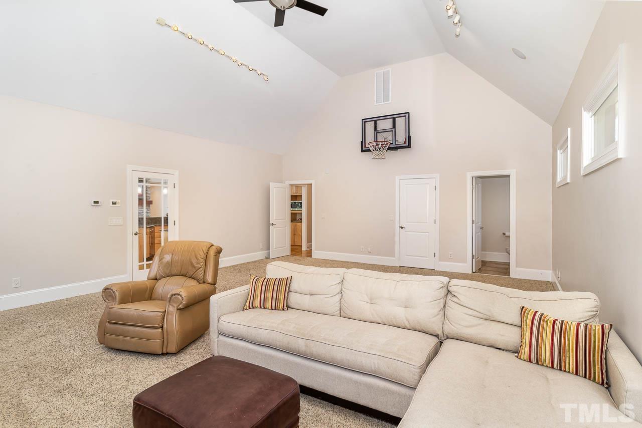 412 Deep Woods Trail Wake Forest, NC 27587 - Photo 34 of 35 a living room with furniture and a couch