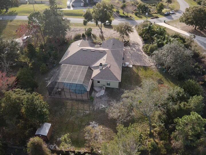 3916 Hunters Ridge Way Titusville, FL 32796 - Photo 34 of 35 3916 Drone back view