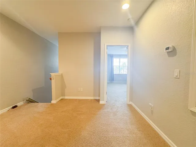 a view of a room with an empty space