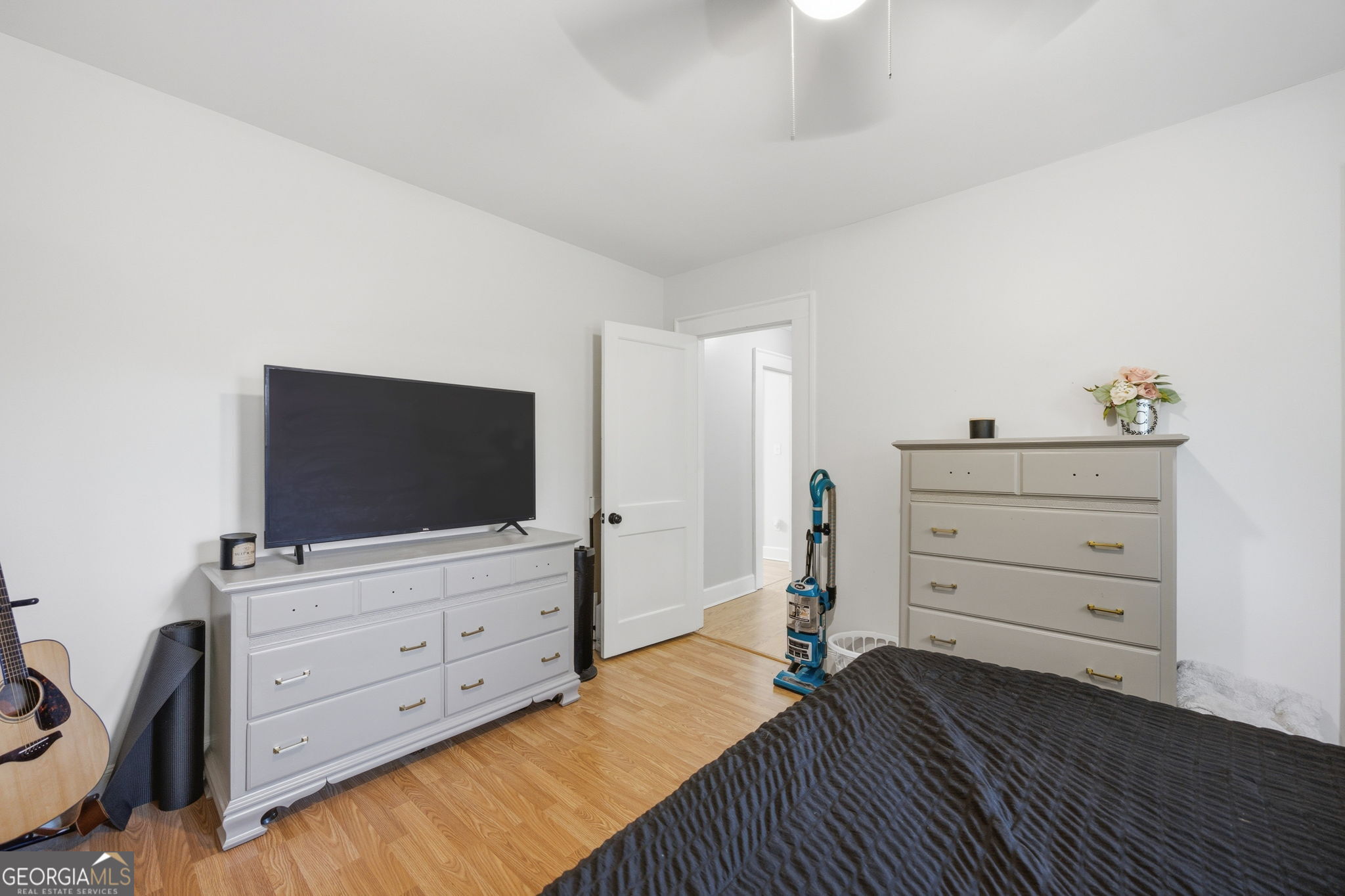 176 Childs Street Gray, GA 31032 - Photo 13 of 22 a room with a bed and flat screen tv