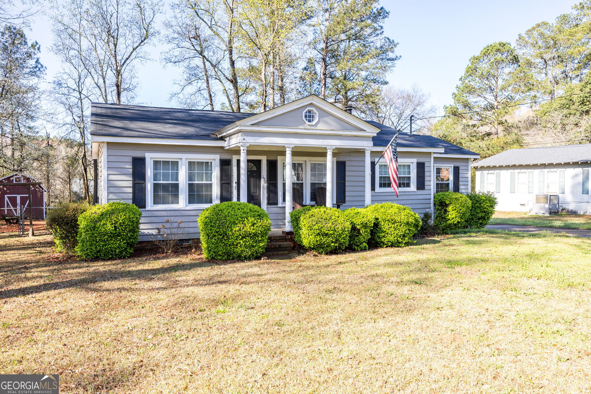 176 Childs Street Gray, GA 31032 - Photo 17 of 22 a front view of a house with garden