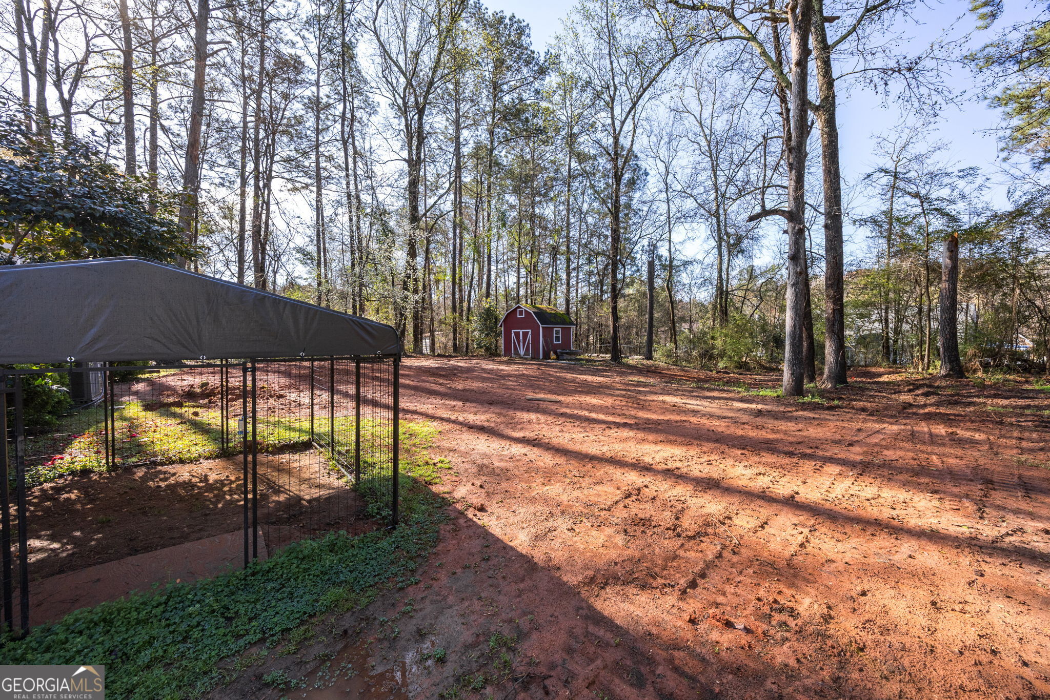 176 Childs Street Gray, GA 31032 - Photo 21 of 22 a backyard of a house with table and chairs