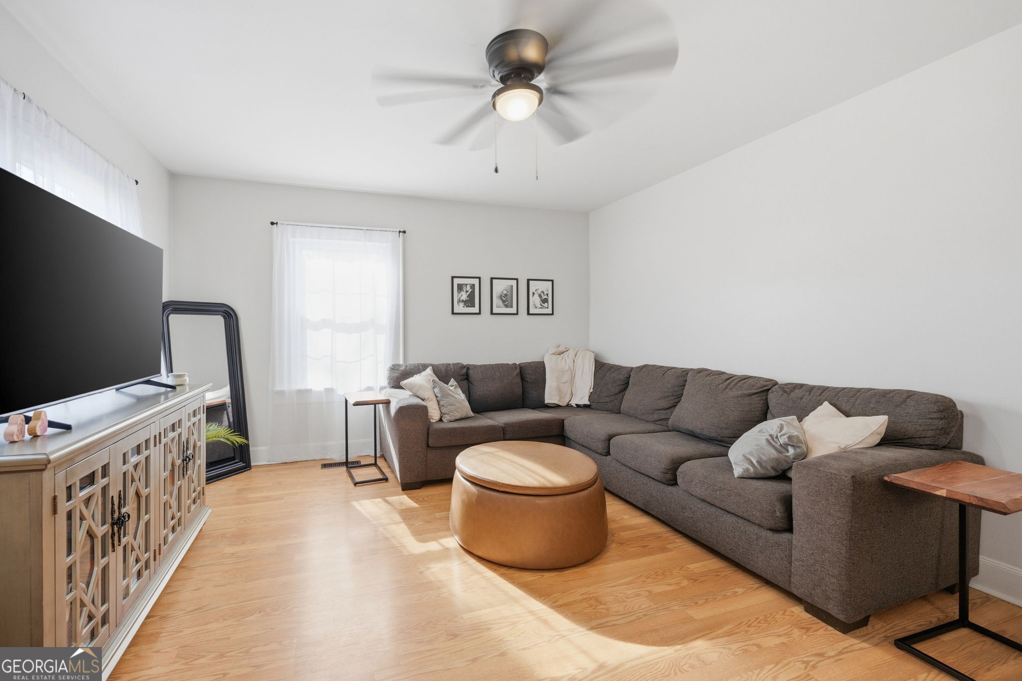 176 Childs Street Gray, GA 31032 - Photo 3 of 22 a living room with furniture and a flat screen tv