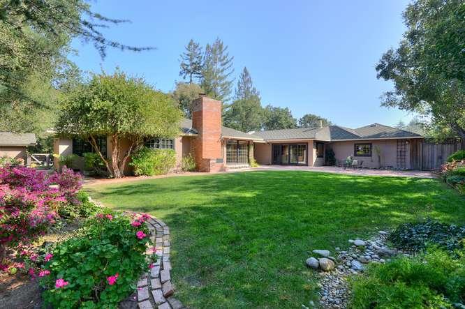 18531 Decatur Road Los Gatos, CA 95030 - Photo 21 of 23 a front view of a house with a yard and fountain in middle