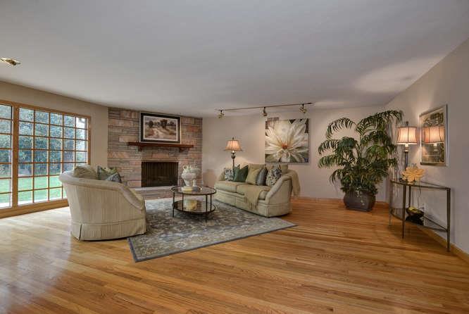 18531 Decatur Road Los Gatos, CA 95030 - Photo 10 of 23 a living room with furniture and a fireplace