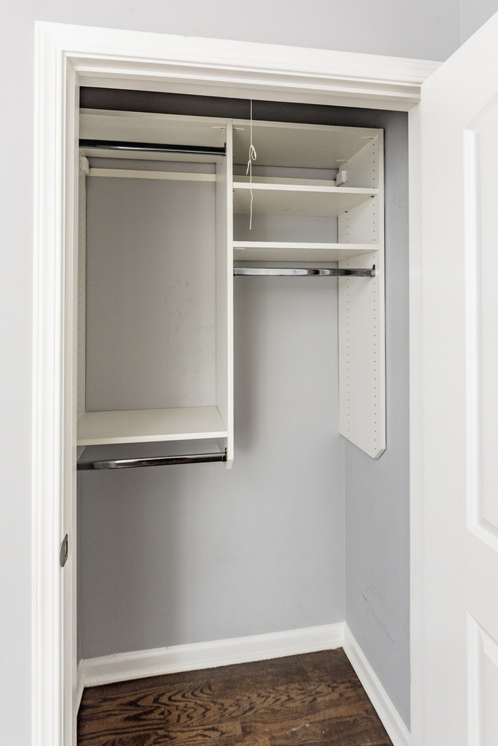 1012 South 1st Avenue, Unit 103 Maywood, IL 60153 - Photo 5 of 13 a view of a room with rack on the wall