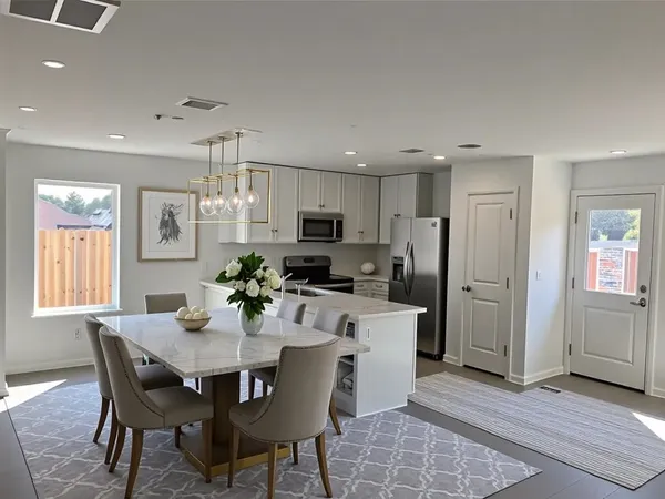 a view of a dining room with furniture