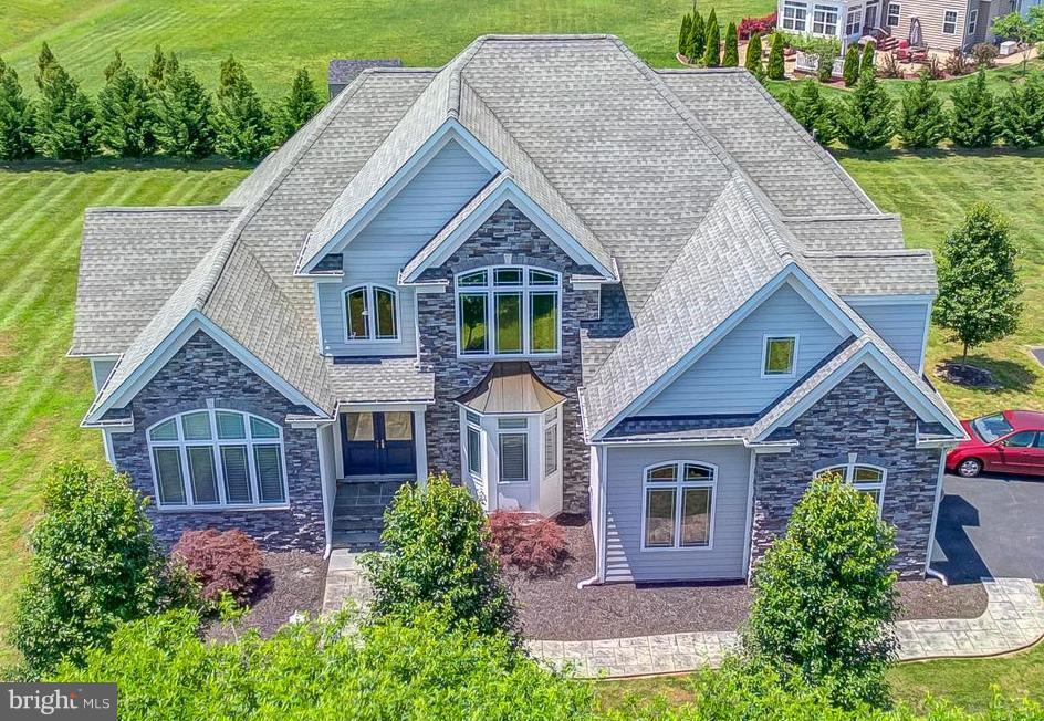 6170 Scaggs Road Owings, MD 20736 - Photo 1 of 30 a house view with a garden space