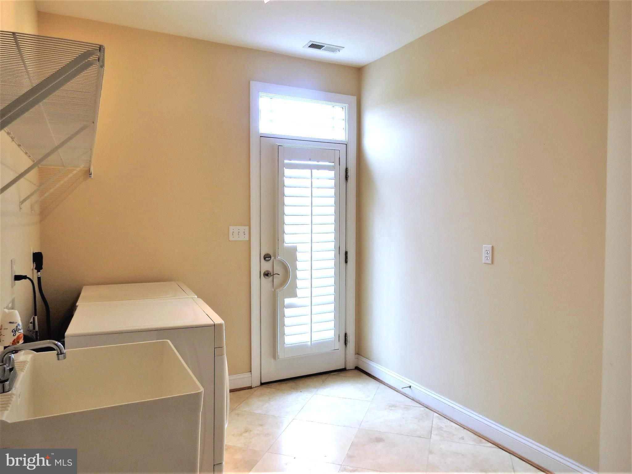 6170 Scaggs Road Owings, MD 20736 - Photo 11 of 30 a room with a bed and a window