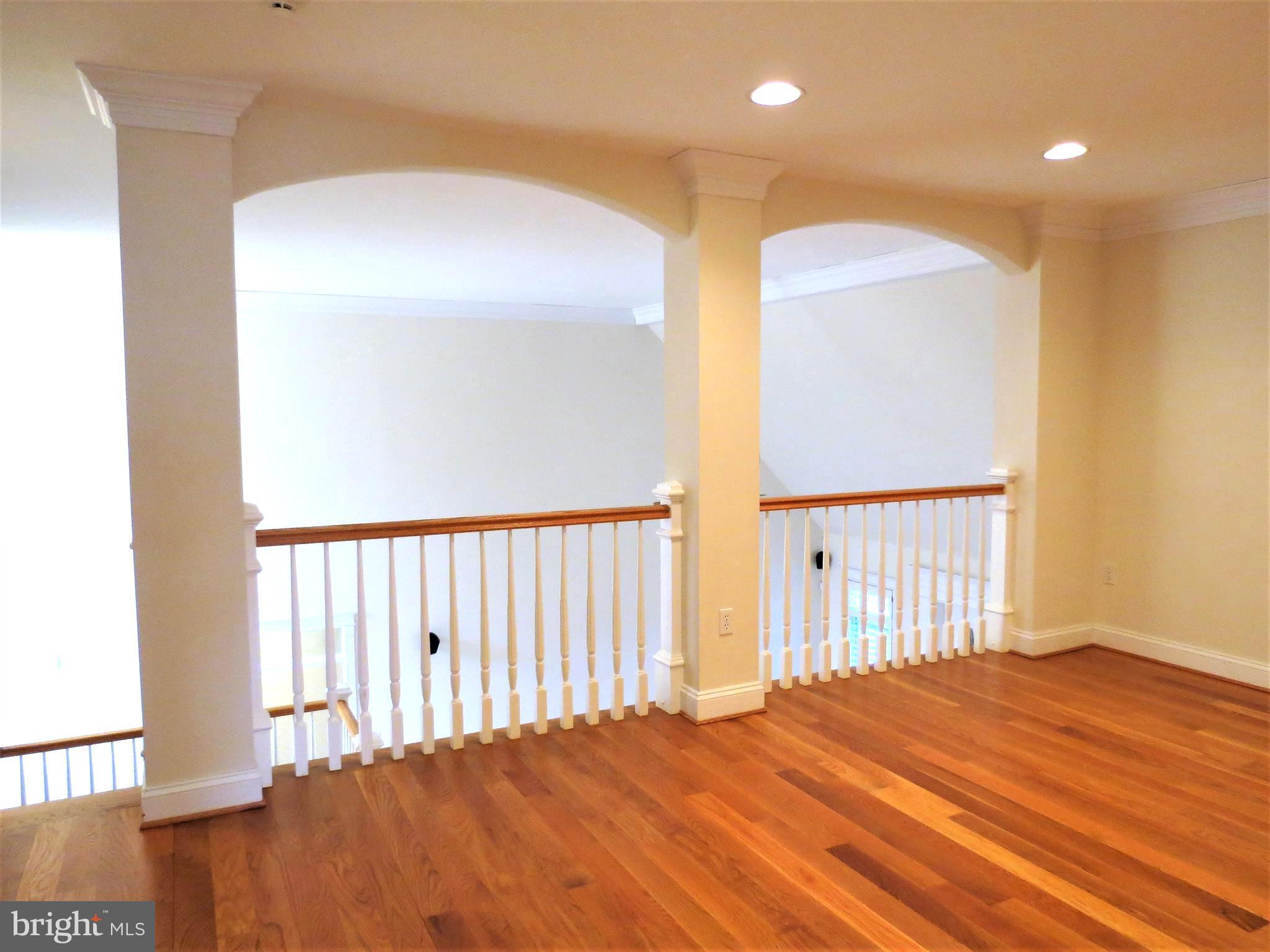 6170 Scaggs Road Owings, MD 20736 - Photo 21 of 30 a view of an empty room with wooden floor