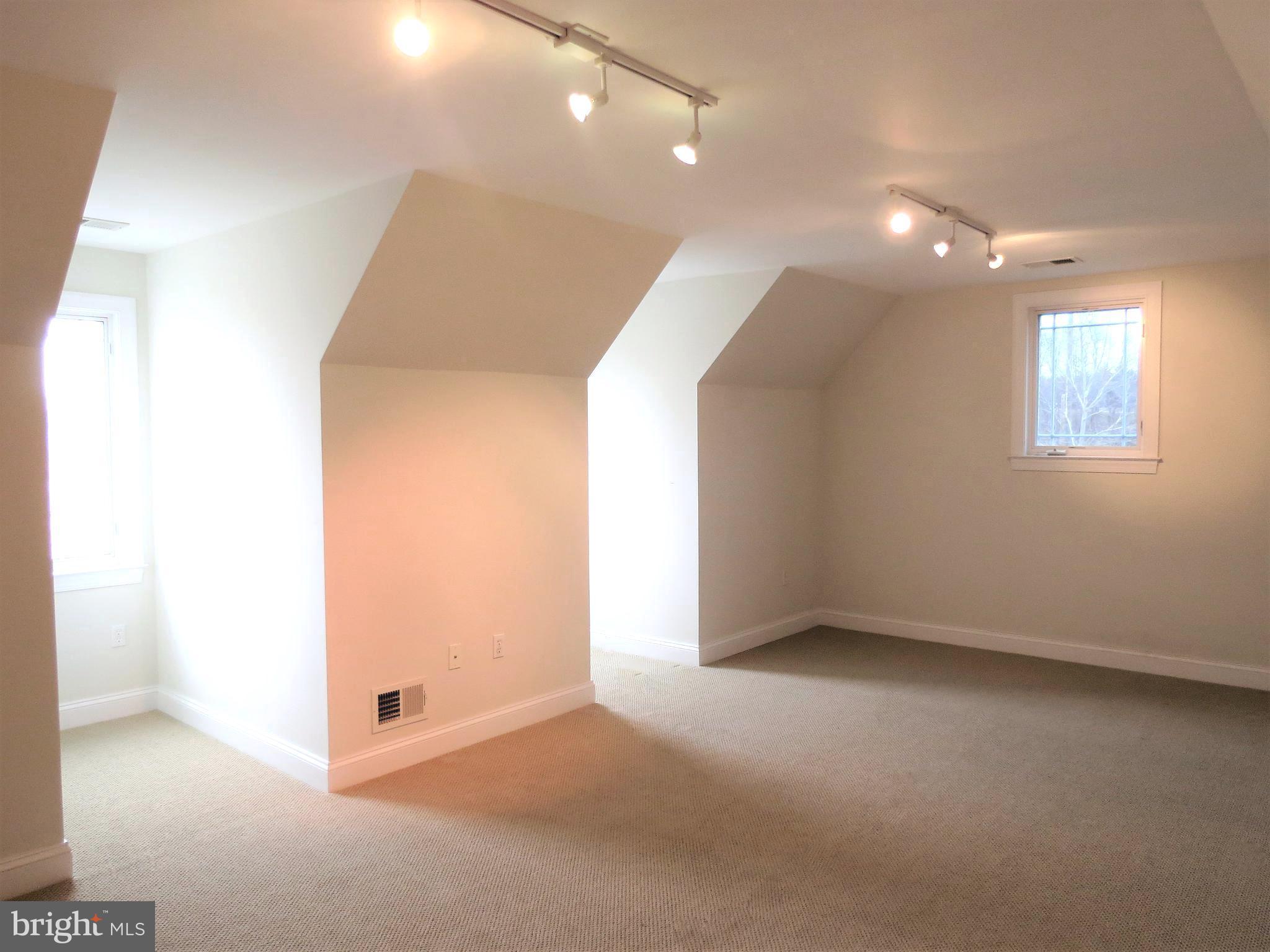 6170 Scaggs Road Owings, MD 20736 - Photo 25 of 30 an empty room with windows and entrance