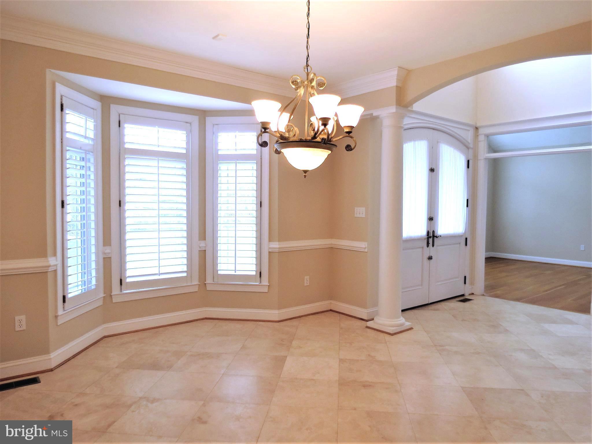 6170 Scaggs Road Owings, MD 20736 - Photo 4 of 30 a view of a room with window and chandelier