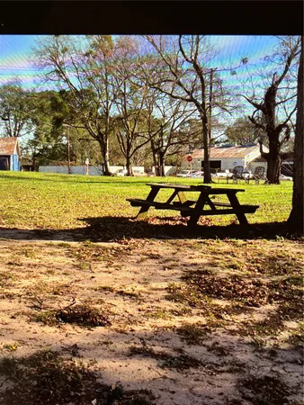 a view of a swimming pool with an outdoor space