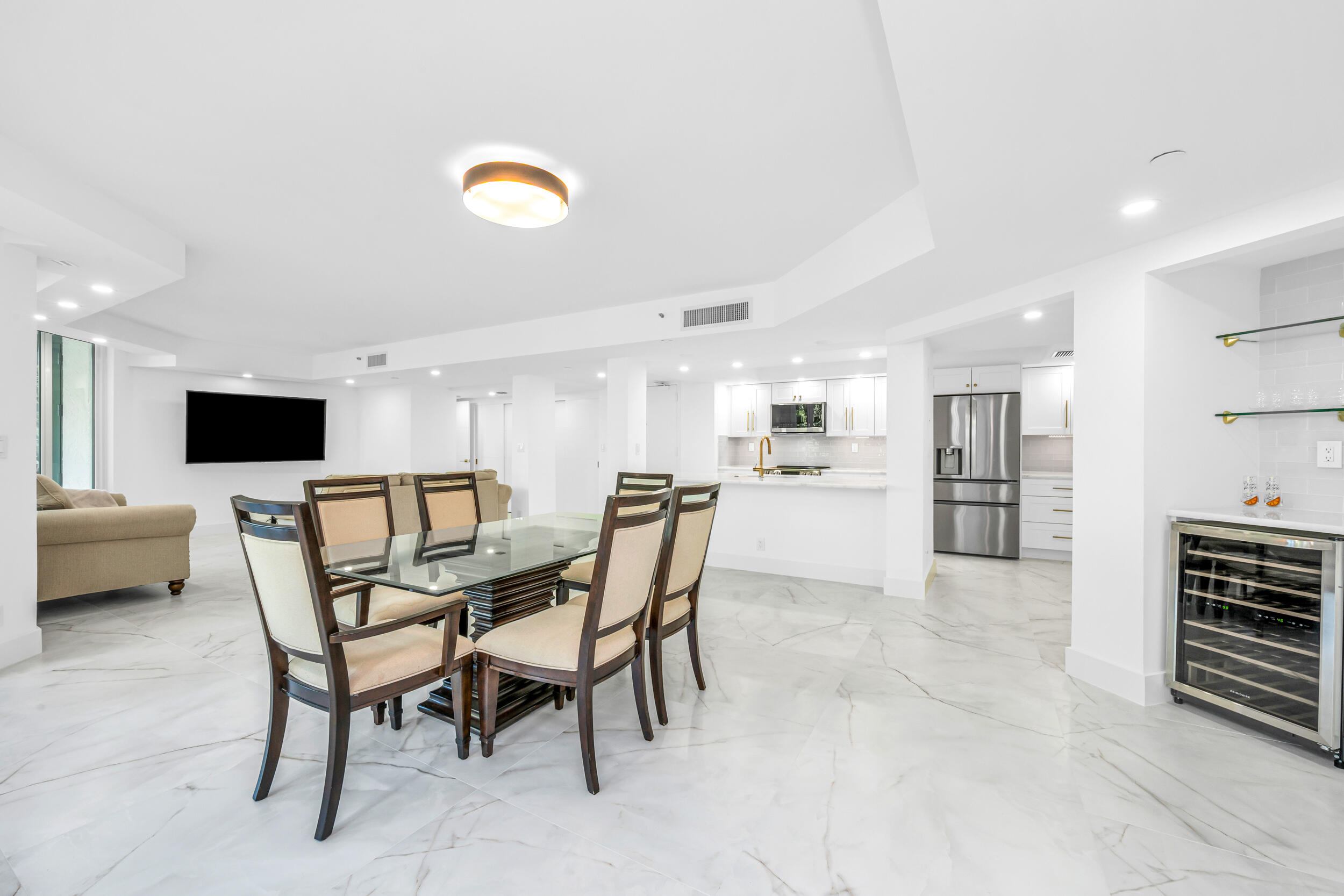 100 Southeast 5th Avenue, Unit 304 Boca Raton, FL 33432 - Photo 11 of 62 a view of kitchen with furniture and a refrigerator