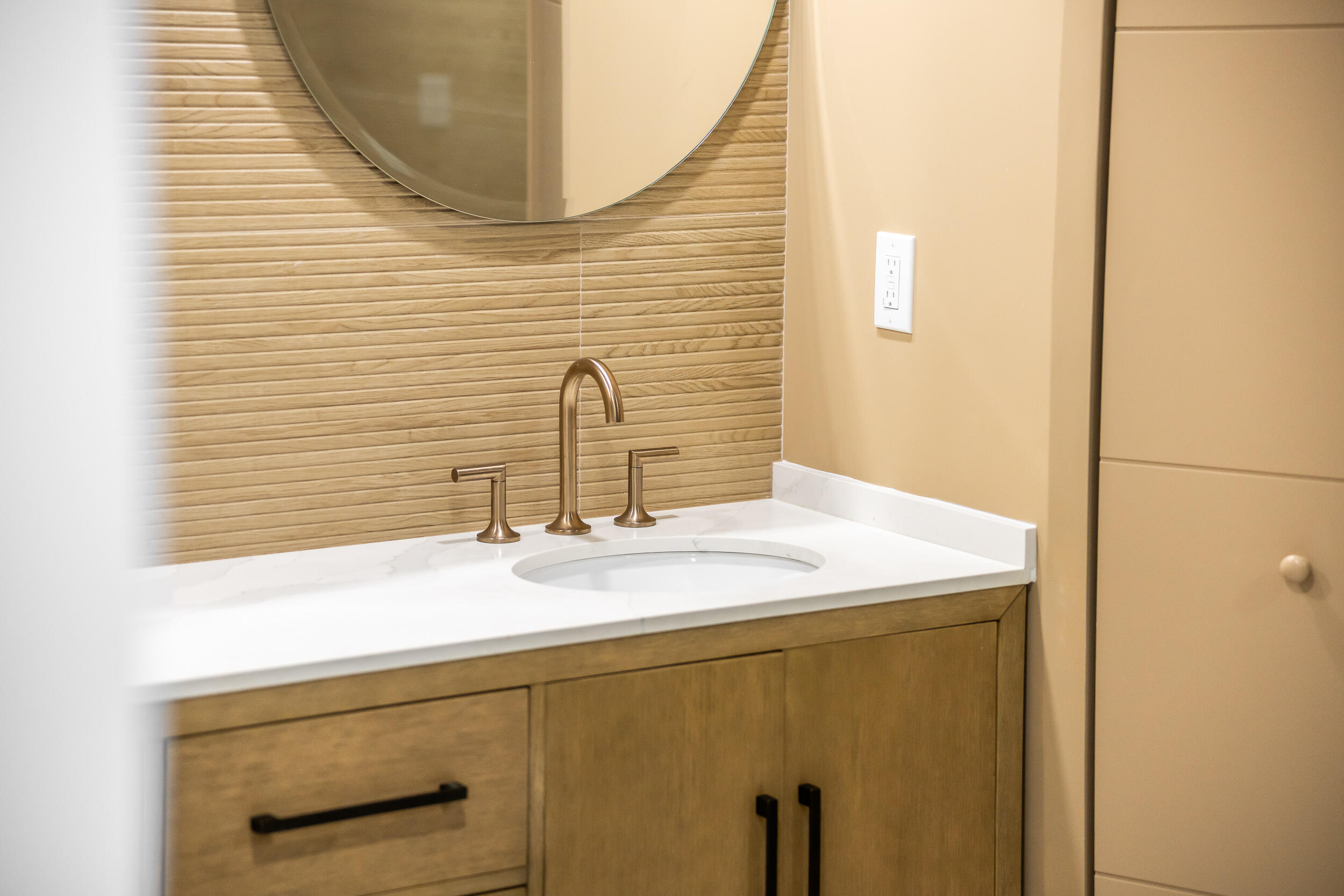 100 Southeast 5th Avenue, Unit 304 Boca Raton, FL 33432 - Photo 14 of 62 a bathroom with a sink and a mirror