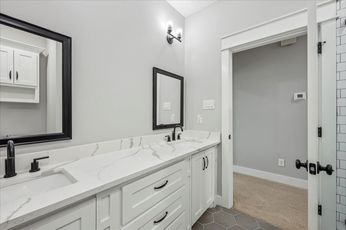 7722 Pond Circle Beaumont, TX 77707 - Photo 28 of 34 a bathroom with a sink and a mirror