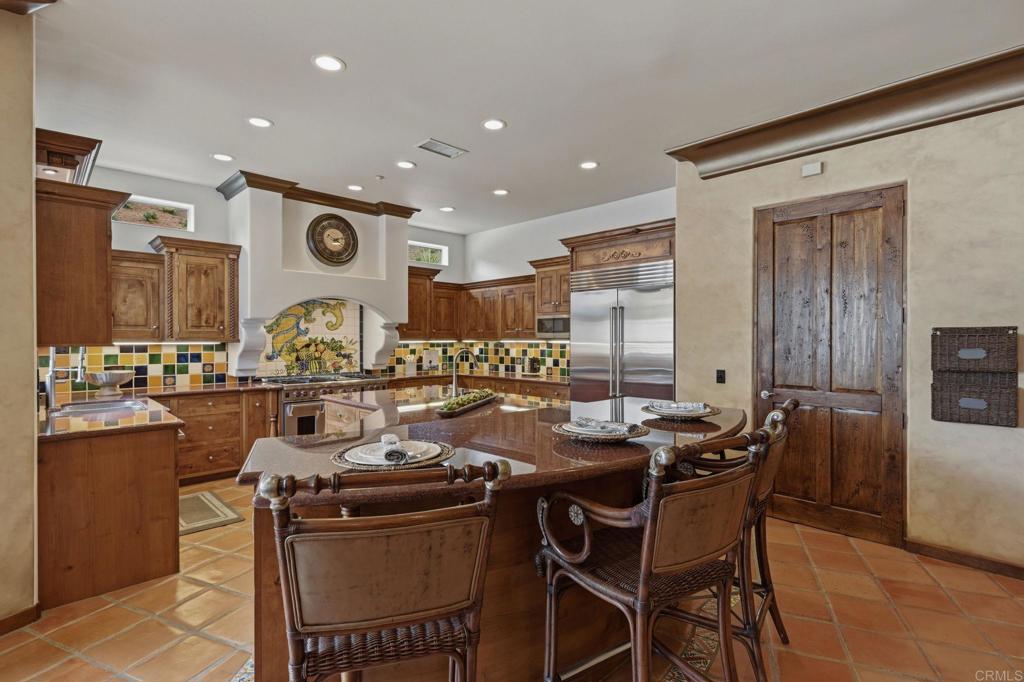 3244 Olivenhain Farms Road Encinitas, CA 92024 - Photo 19 of 47 a view of a dining room with furniture