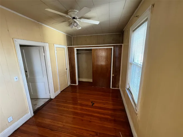 a view of entryway with wooden floor