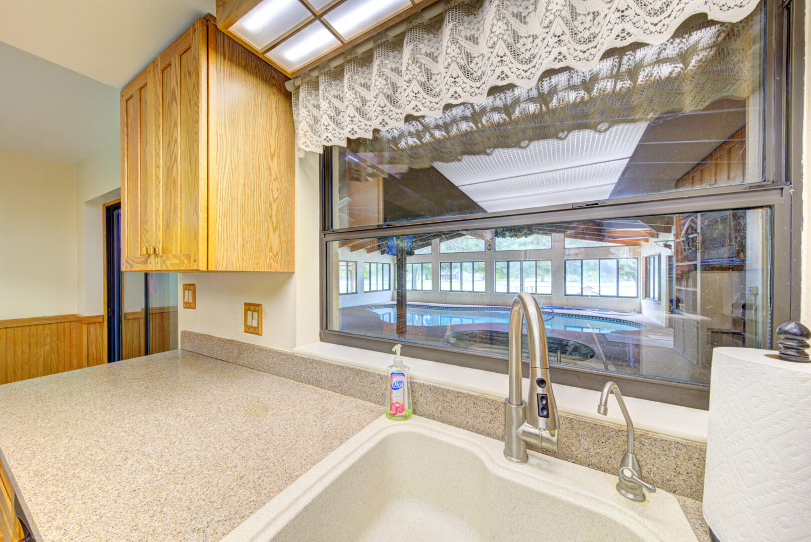 4885 Rayburn Road Cocoa, FL 32926 - Photo 33 of 99 kitchen sink view of pool