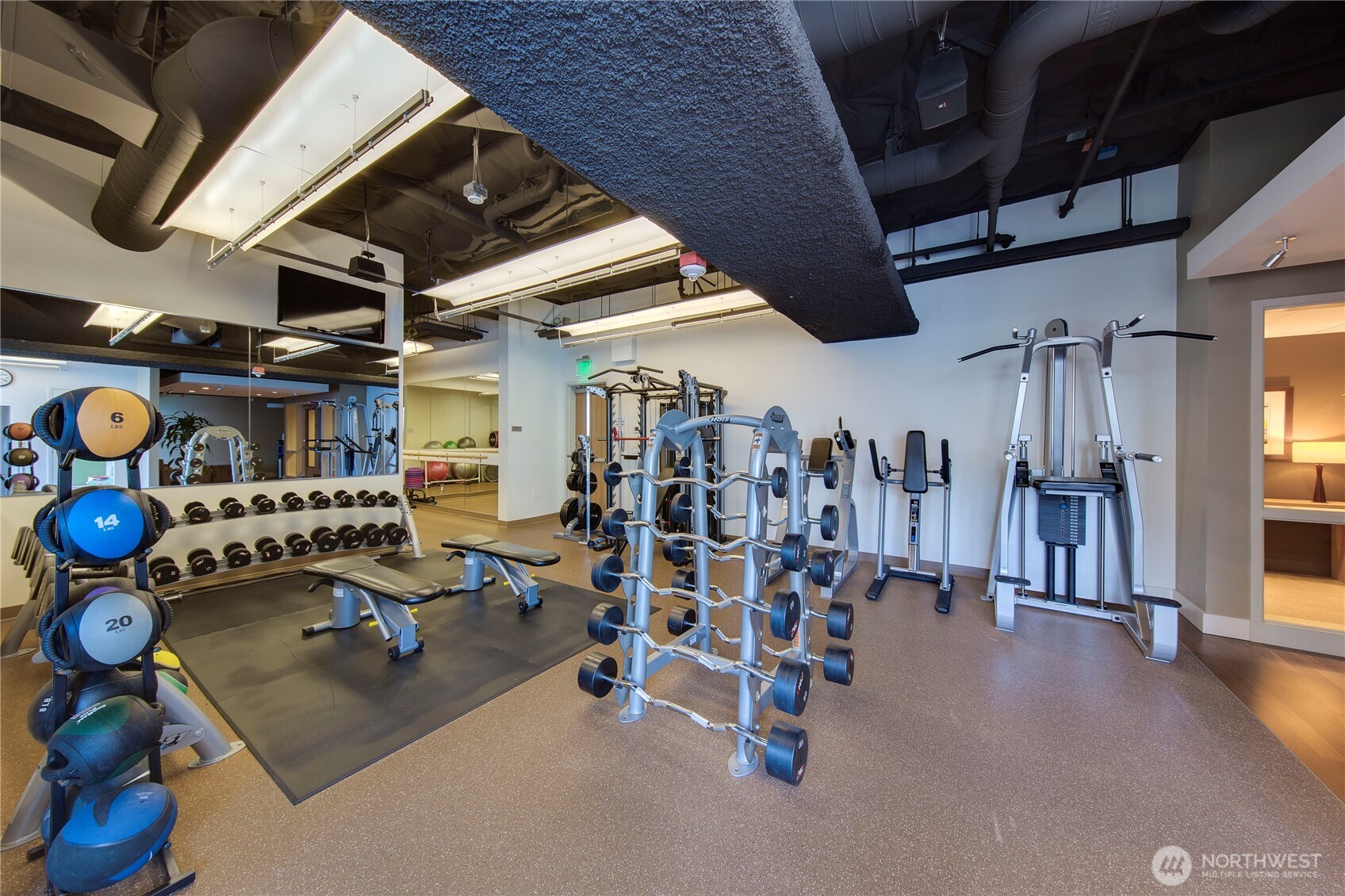 1521 2nd Avenue, Unit 2800 Seattle, WA 98101 - Photo 32 of 35 a view of a room with gym equipment