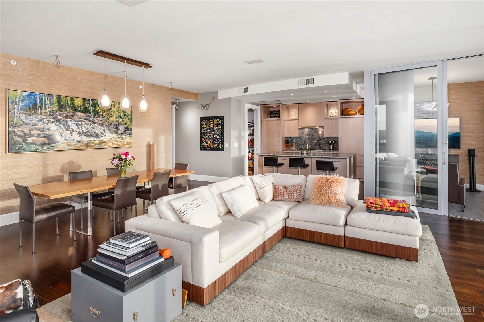 1521 2nd Avenue, Unit 2800 Seattle, WA 98101 - Photo 7 of 35 a living room with furniture and a floor to ceiling window