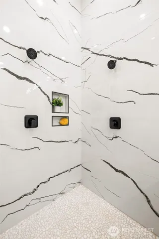 a view of a bathroom with a shower