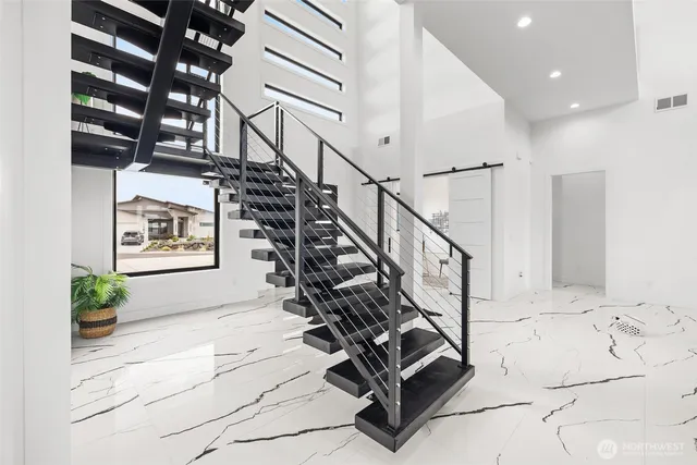 a view of entryway with a front door