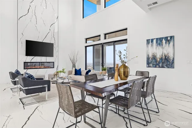 a view of a livingroom with furniture window and a flat screen tv